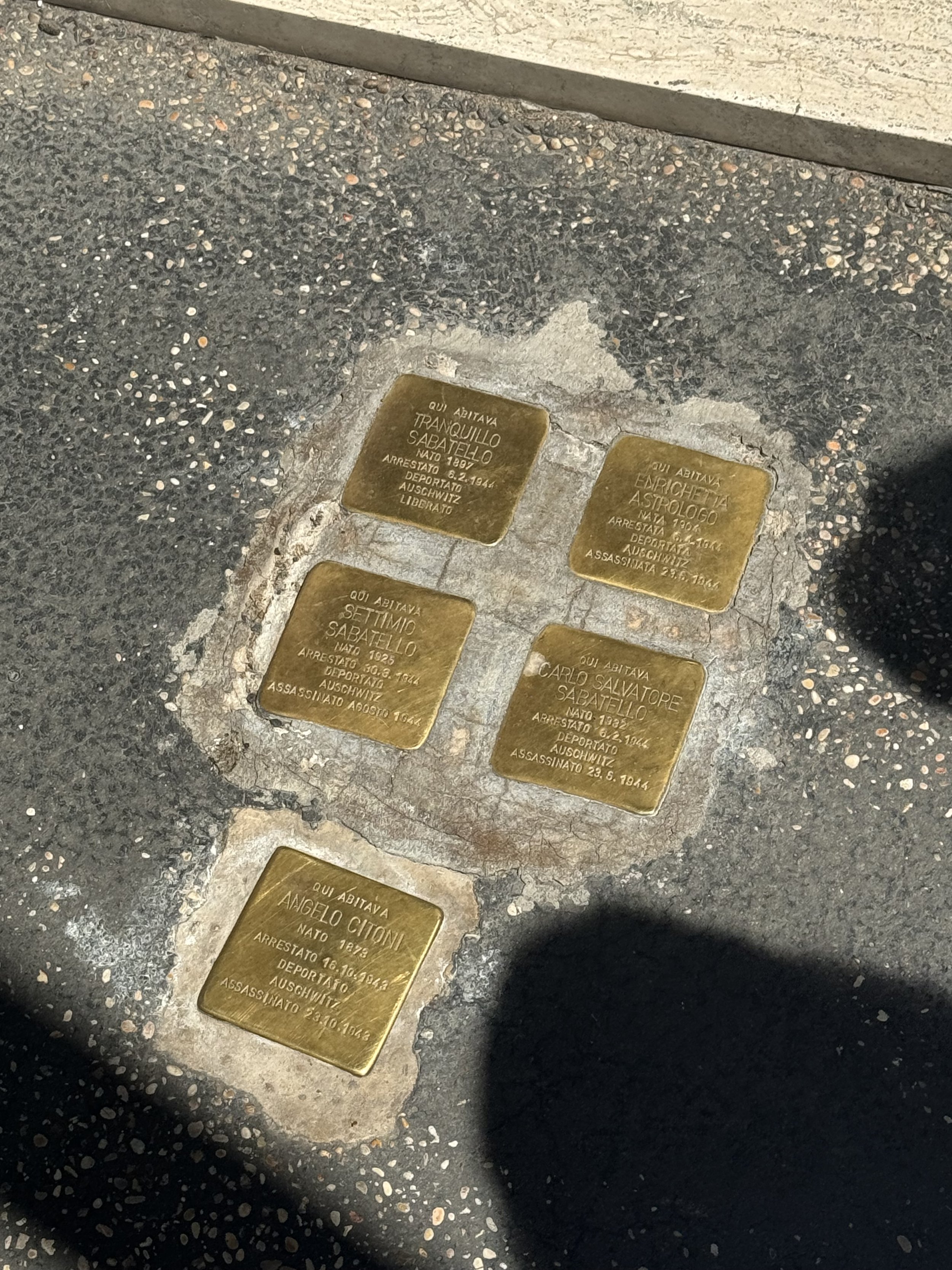 Stumble Stones honoring those taken to concentration camps in the Holocaust. Photographed by Peter Ankerberg.