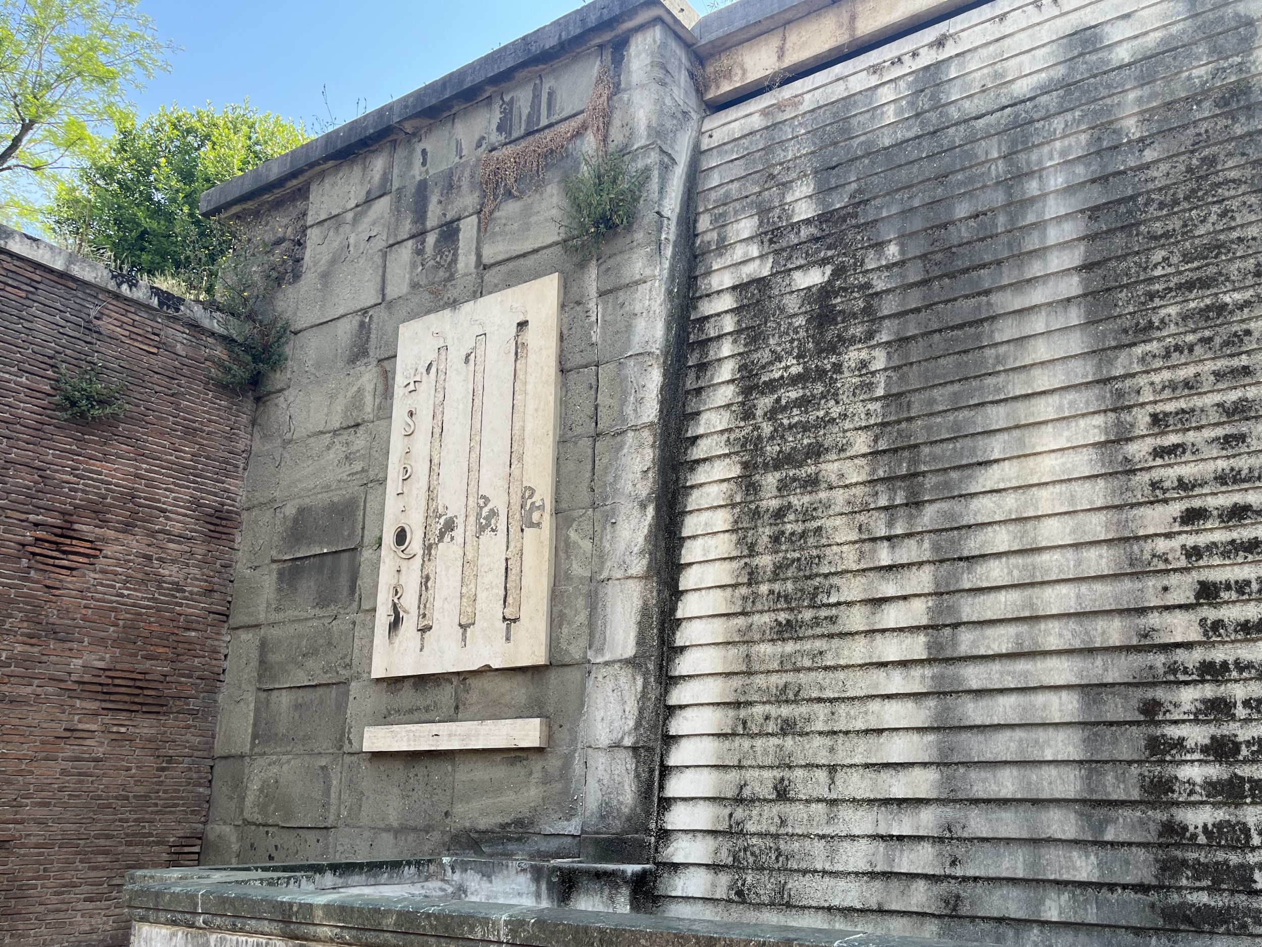 Fasces symbol located along the Via dei Trionfi (Via di San Gregorio). Photographed by Reid Graham.