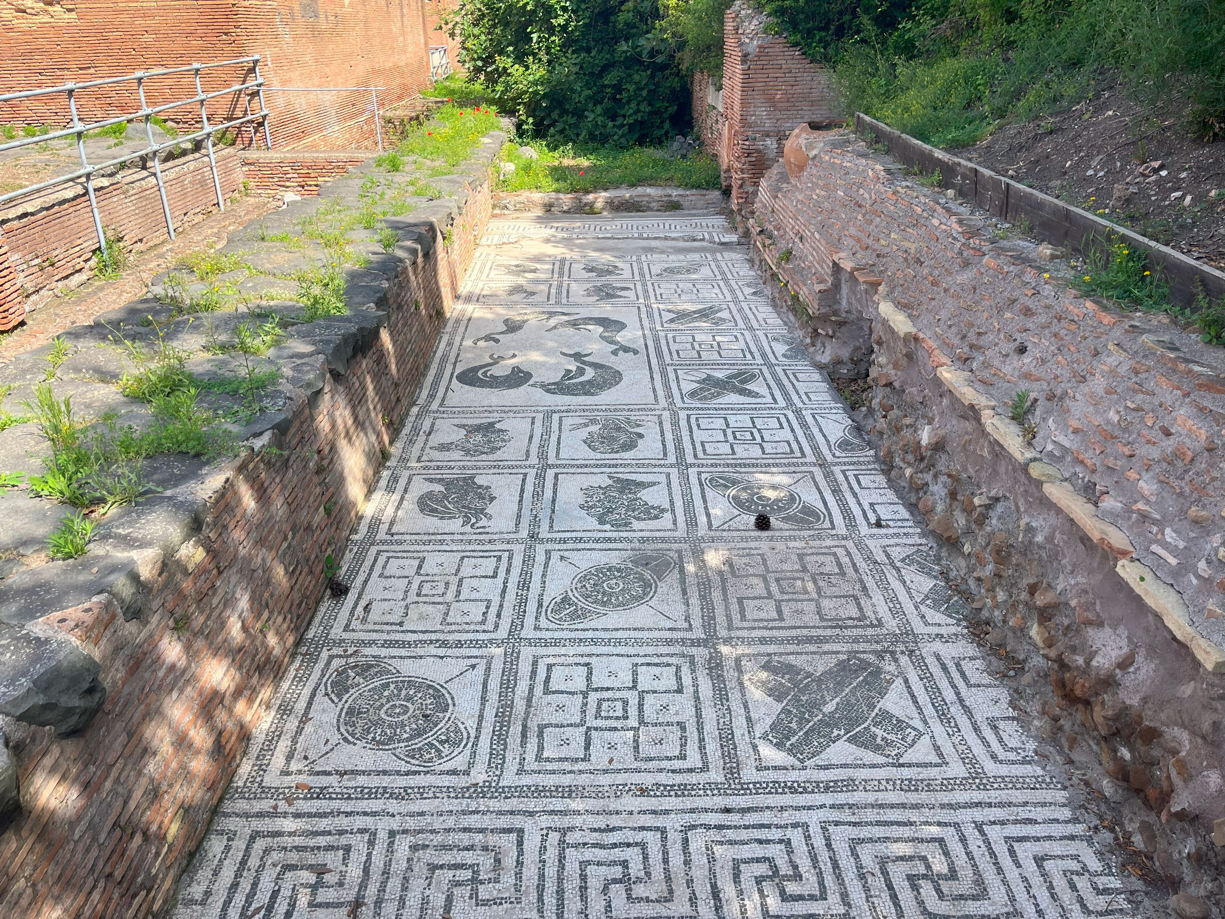 Commonly found black and white mosaics at Ostia Antica. Photographed by Luke Lynch.