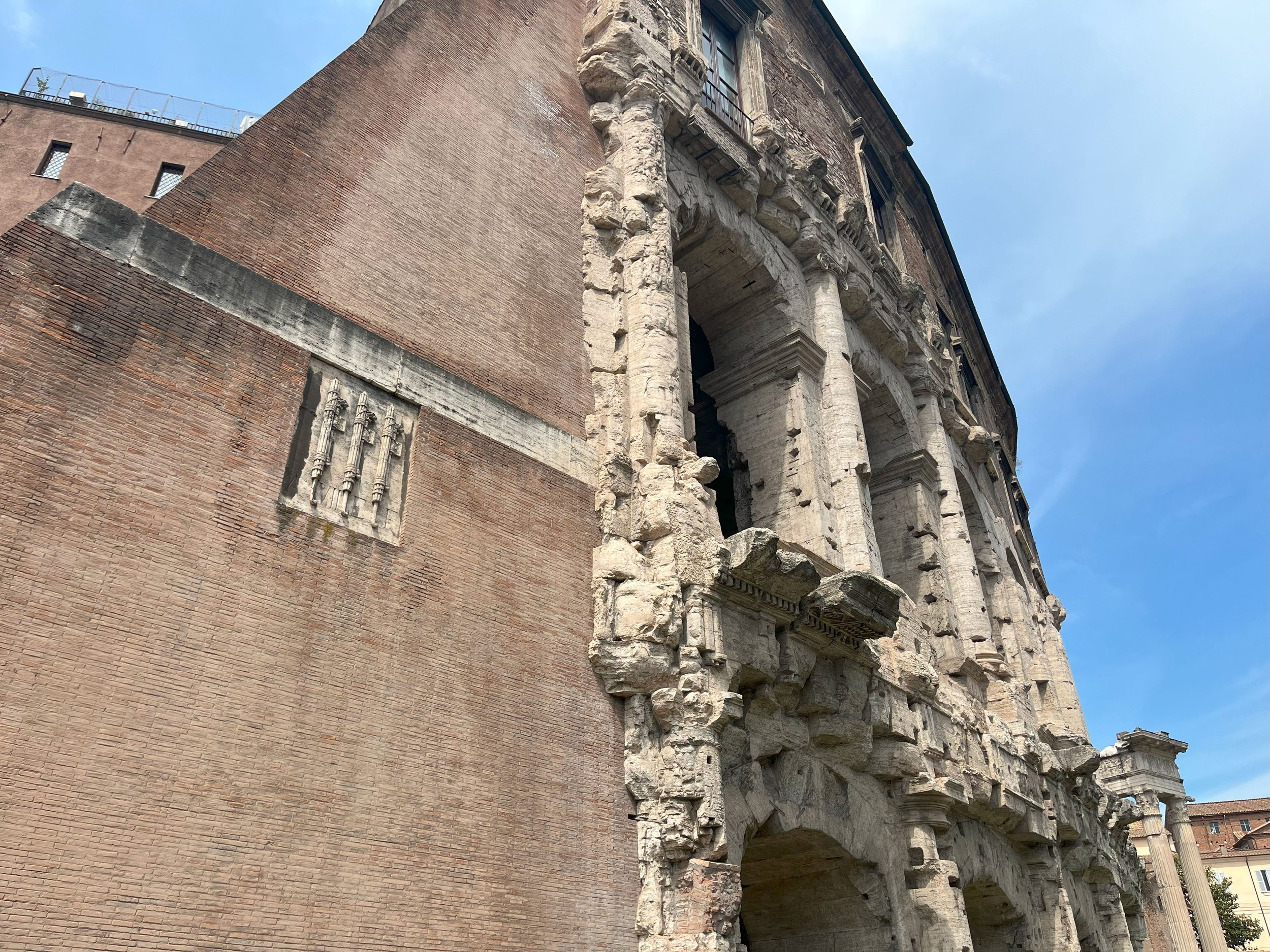 Fascist iconography visible on Theater of Marcellus facade. Photographed by Lucy Martin.
