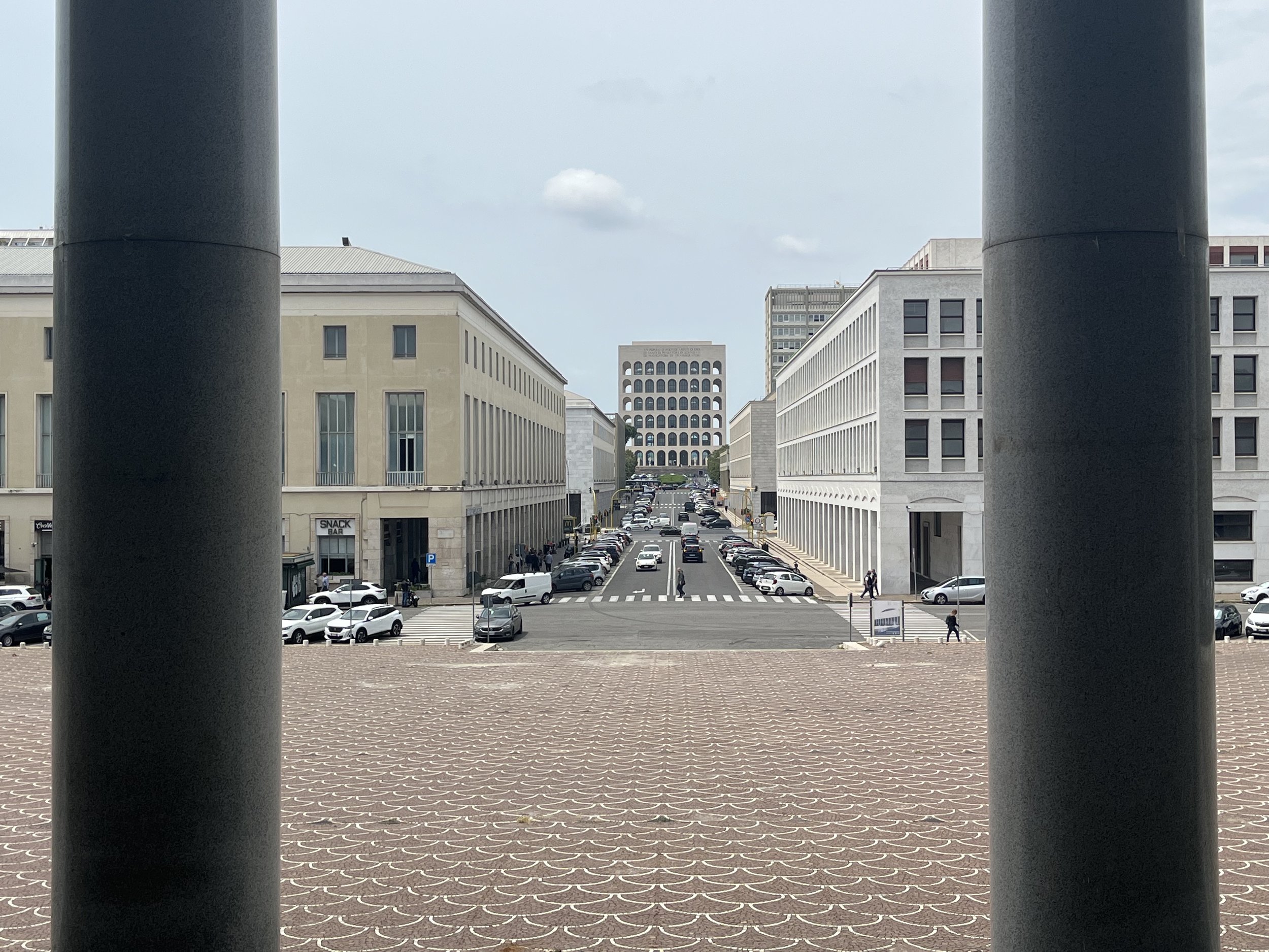 View towards Palazzo della Civilta Italian from Palazzo Dei Congressi along the Viale della Civilta del Lavoro. Photographed by Luke Lynch.