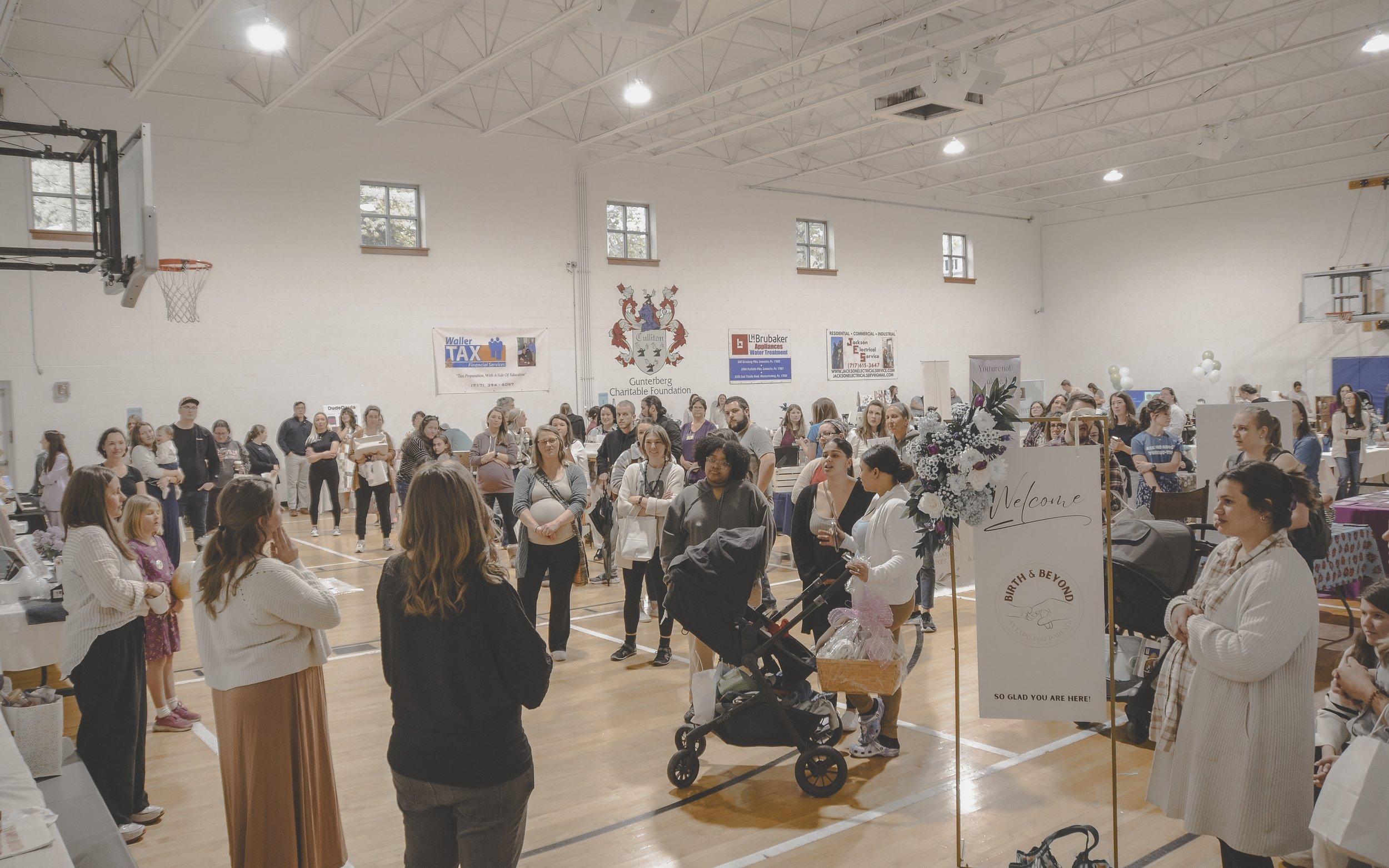 a gathering of people at a previous NEST Expo