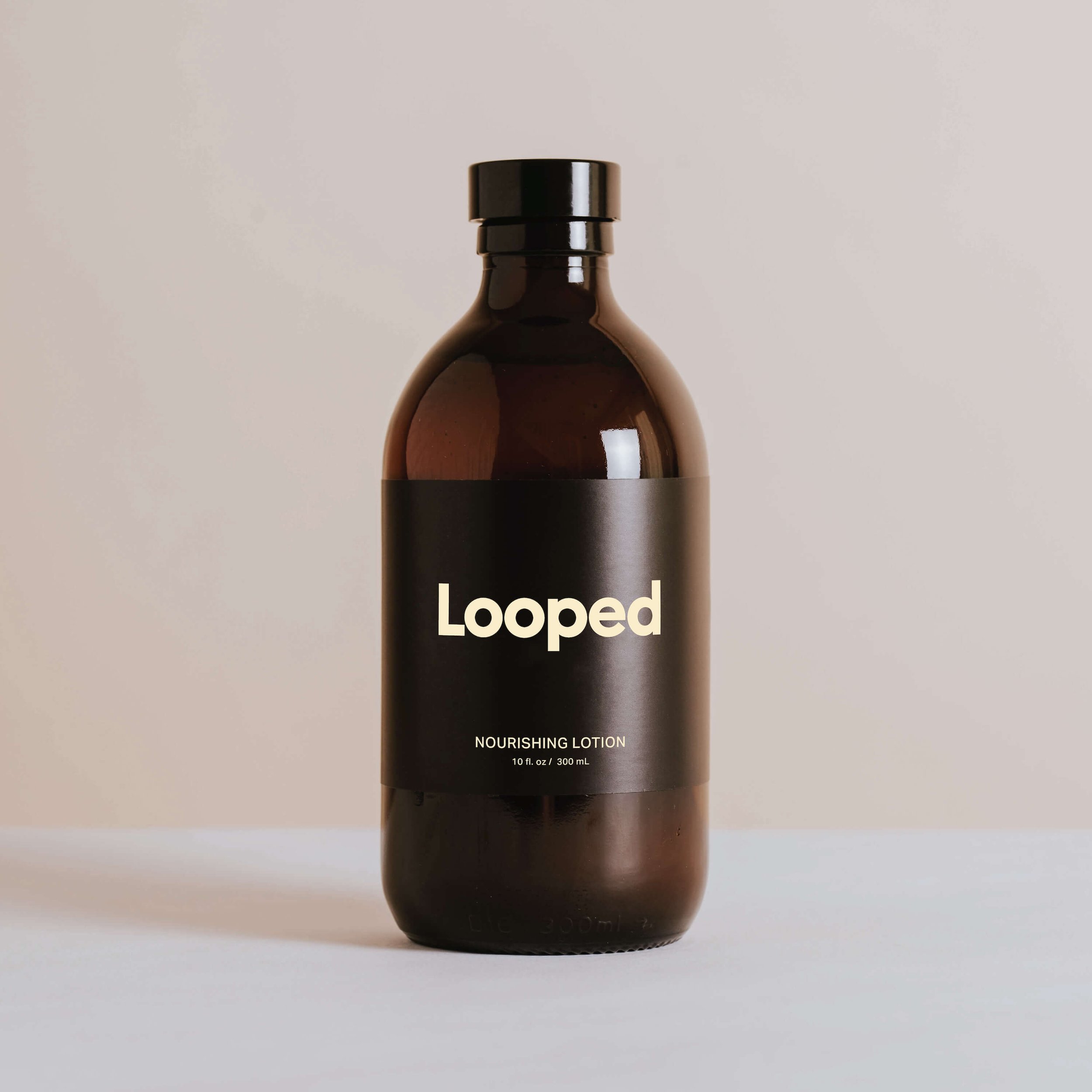 Immagine di un flacone di Looped Nourishing Lotion.
