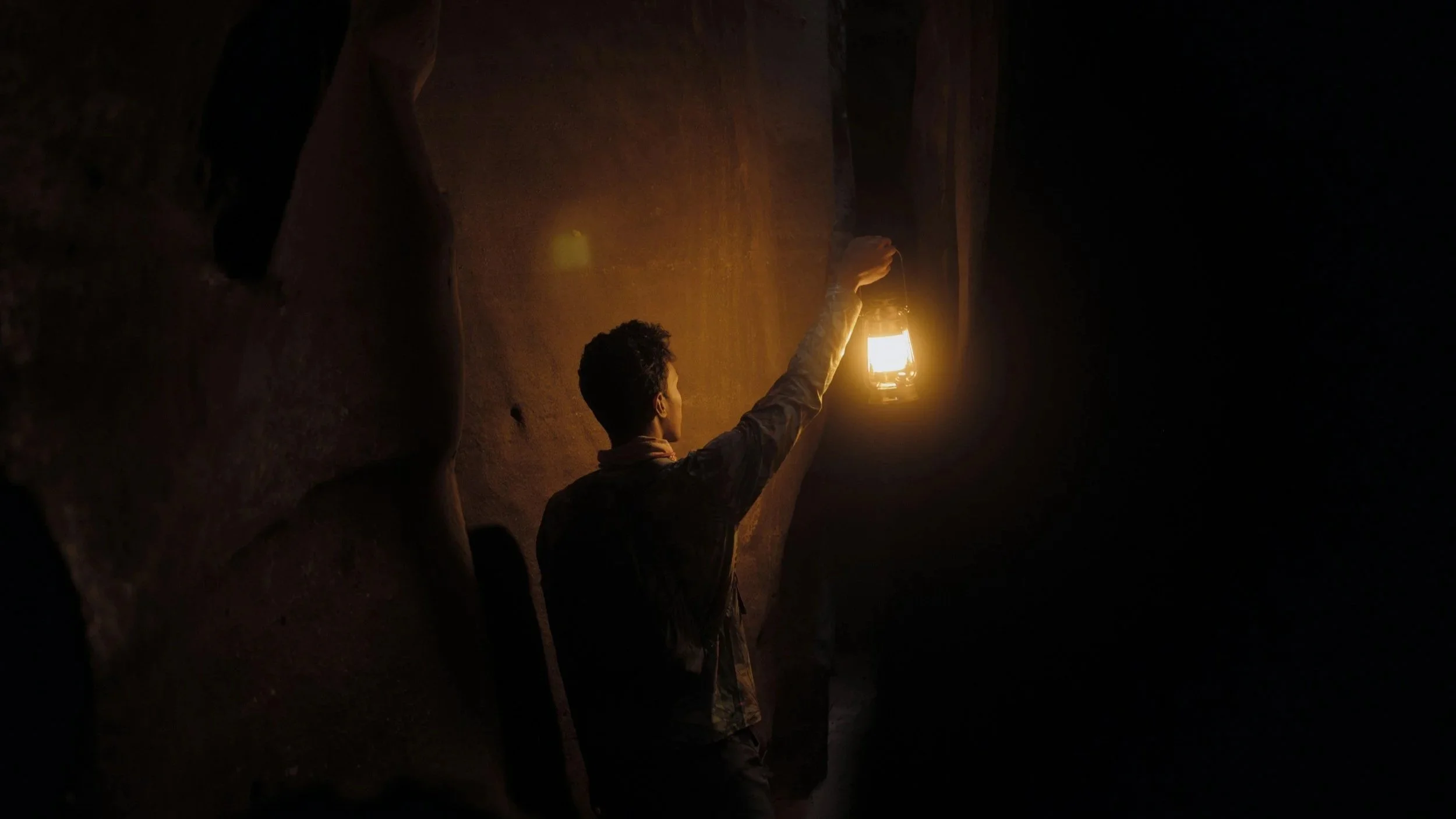 Modern wooden cabin in a mountainous landscape