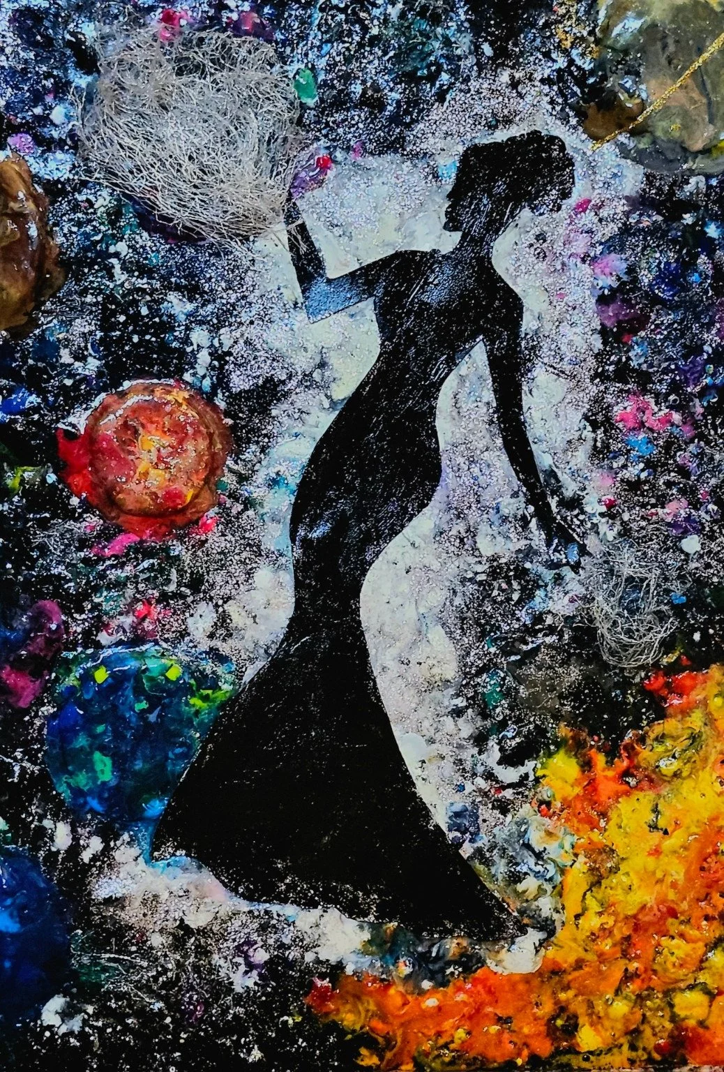 She Holds the Universe