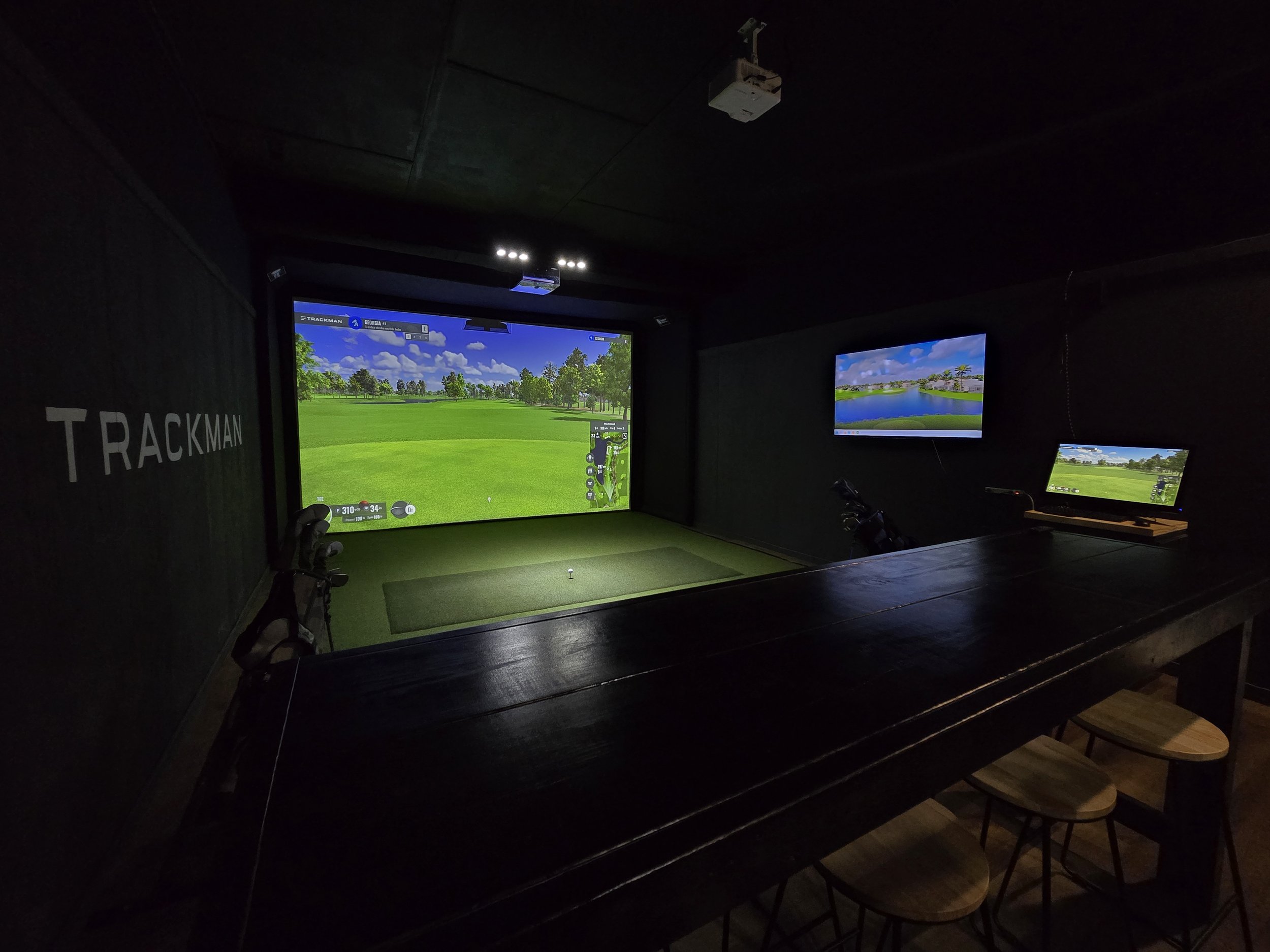 Happy G's golf simulator setup with TrackMan