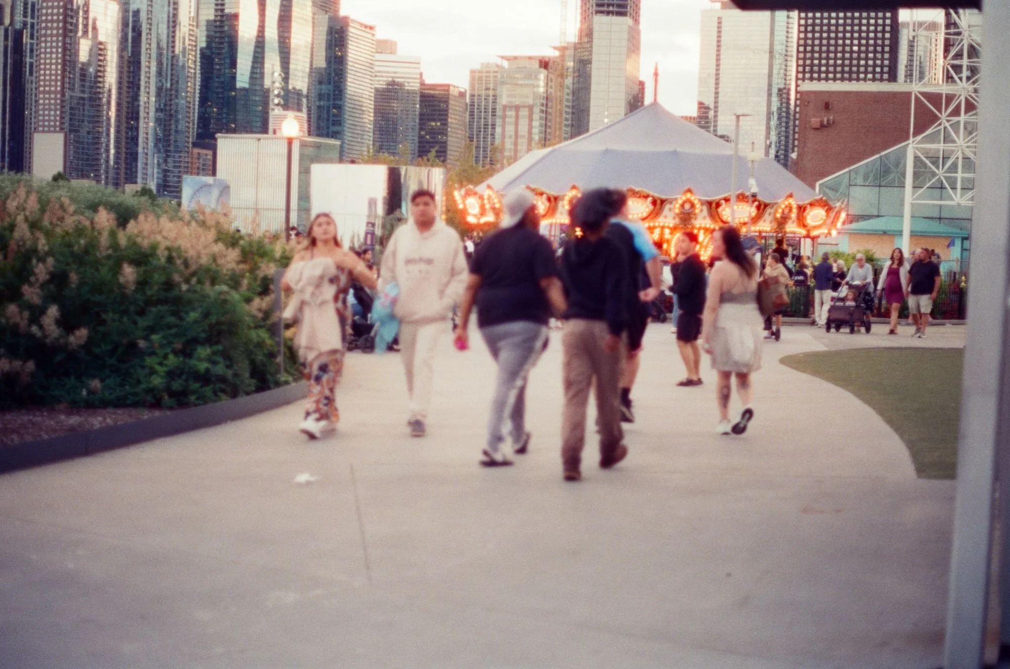 chicago day &amp; night. 🌃

the halation went nuts with this film. chicago has my heart. 

camera: canon AE-1 Program @canonusa 

film: cinestill xpro c-41 800 Tungsten @cinestillfilm 

location: chicago @chicago.explore 

developed &amp; scans: @ni
