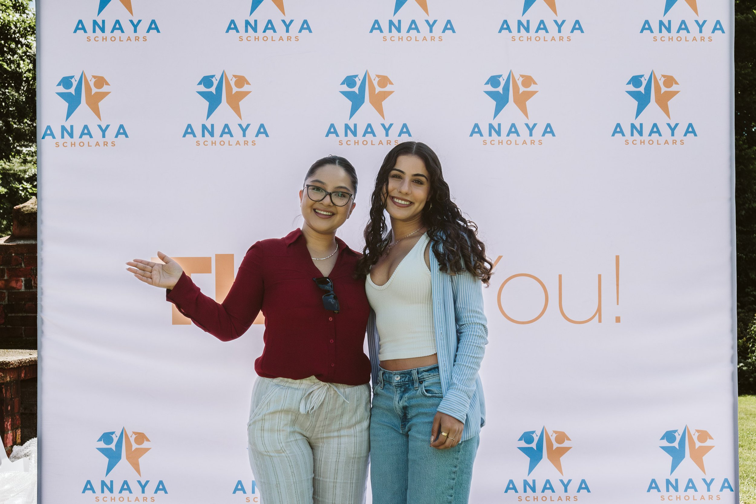 Scholars with banner