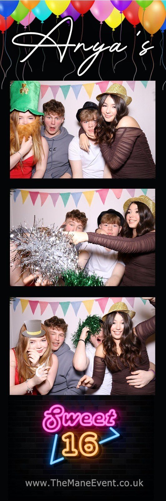 Birthday photo booth with four teens in festive outfits, hats, and props against a colorful banner backdrop, celebrating a Sweet 16 event.