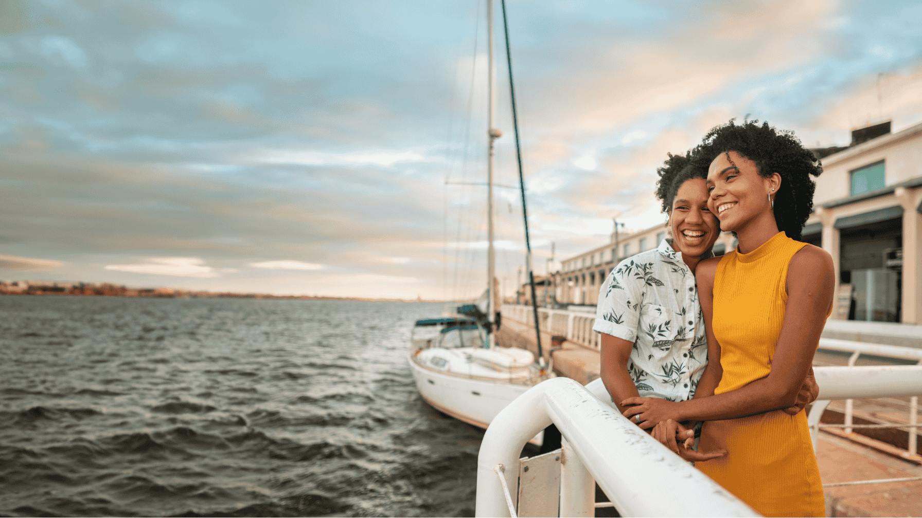 Family-Building Services & Fertility Treatment for Lesbians - Lesbian Couple on a dock