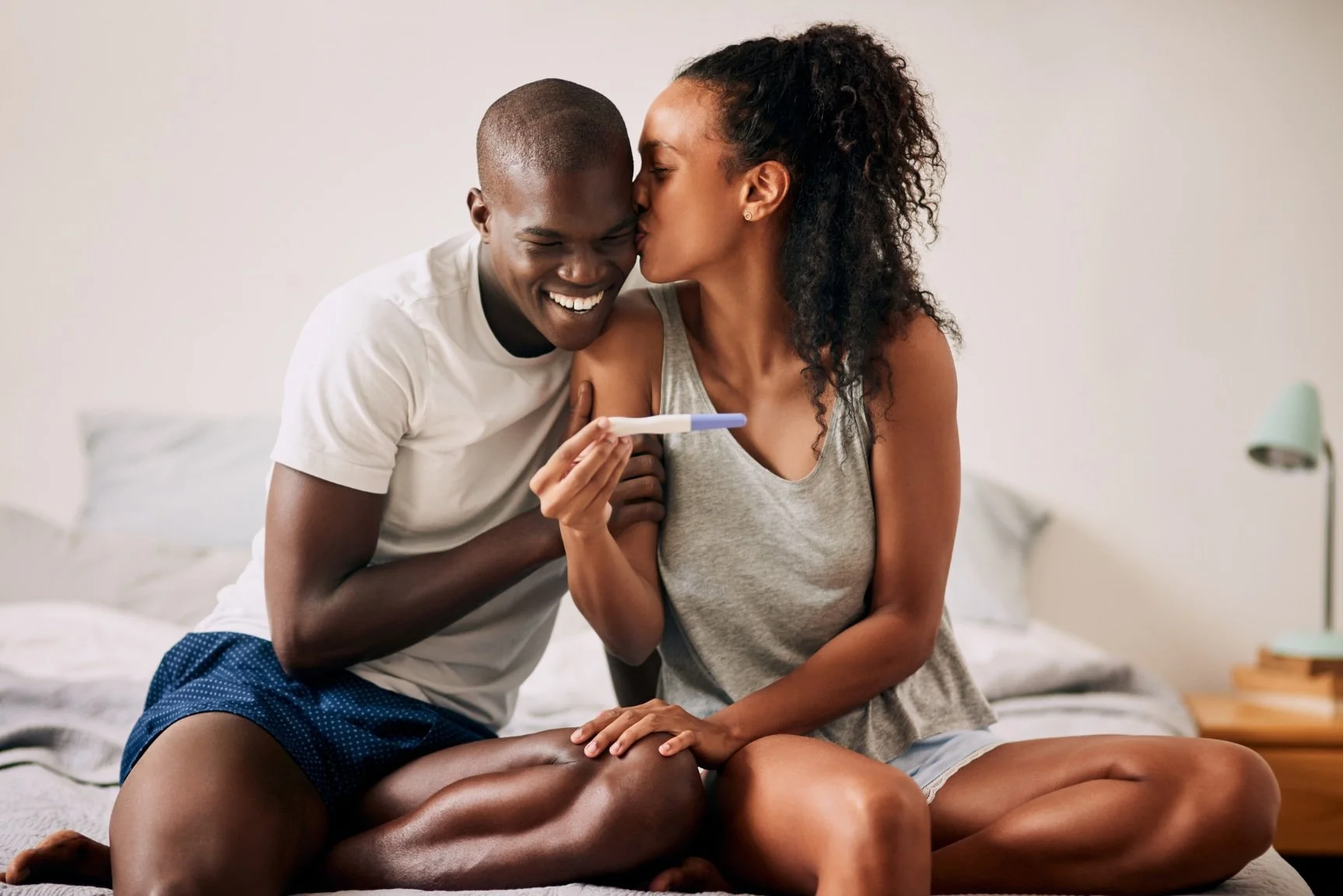 Couple looking at a pregnancy test