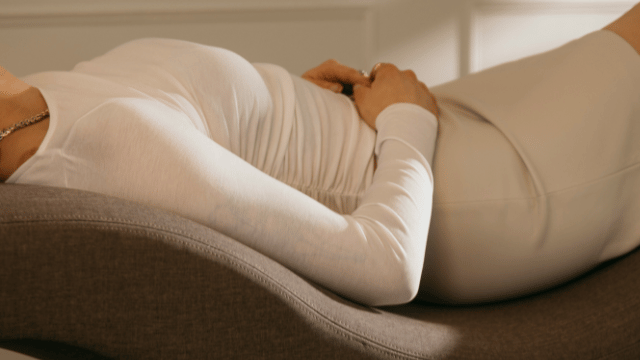 Woman laying down for blog on Preparing for IVF: What to Expect & Helpful Tips