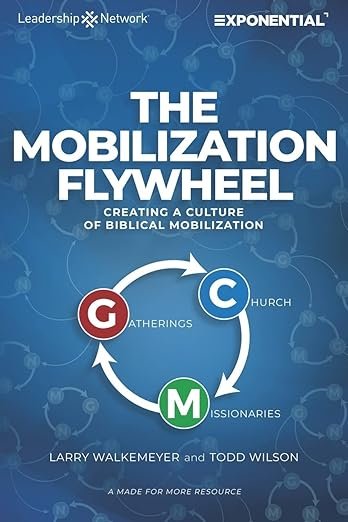 Cover of the book titled 'The Mobilization Flywheel' showing a diagram with three circles labeled 'G - Gatherings', 'C - Church', and 'M - Missionaries' connected in a cycle. Authors are Larry Walkemyer and Todd Wilson.