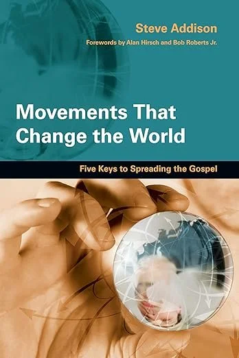 Book cover titled "Movements That Change the World" by Steve Addison, with forewords by Alan Hirsch and Bob Roberts Jr., showing a hand holding a globe.