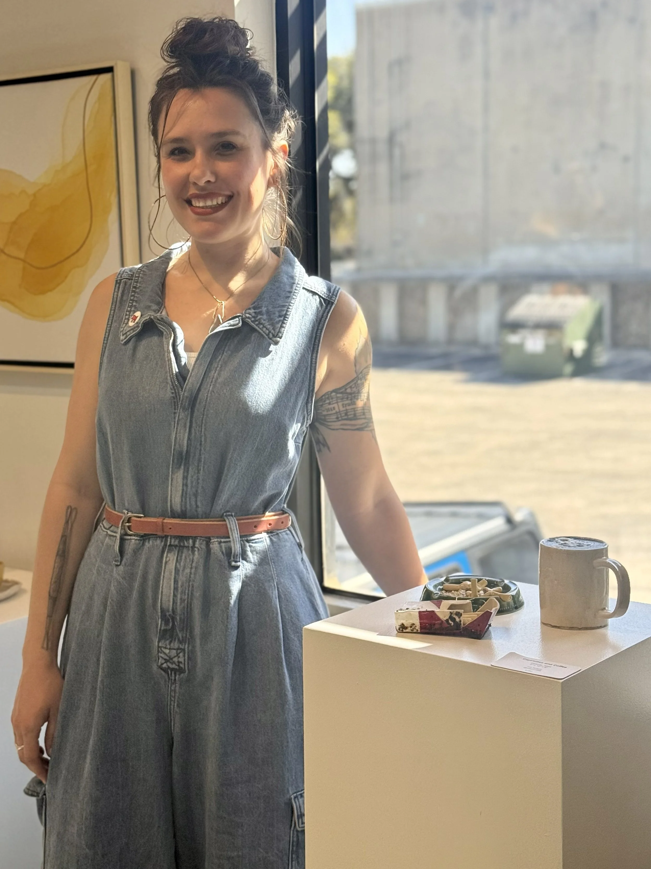 Woman artist with ceramic sculpture