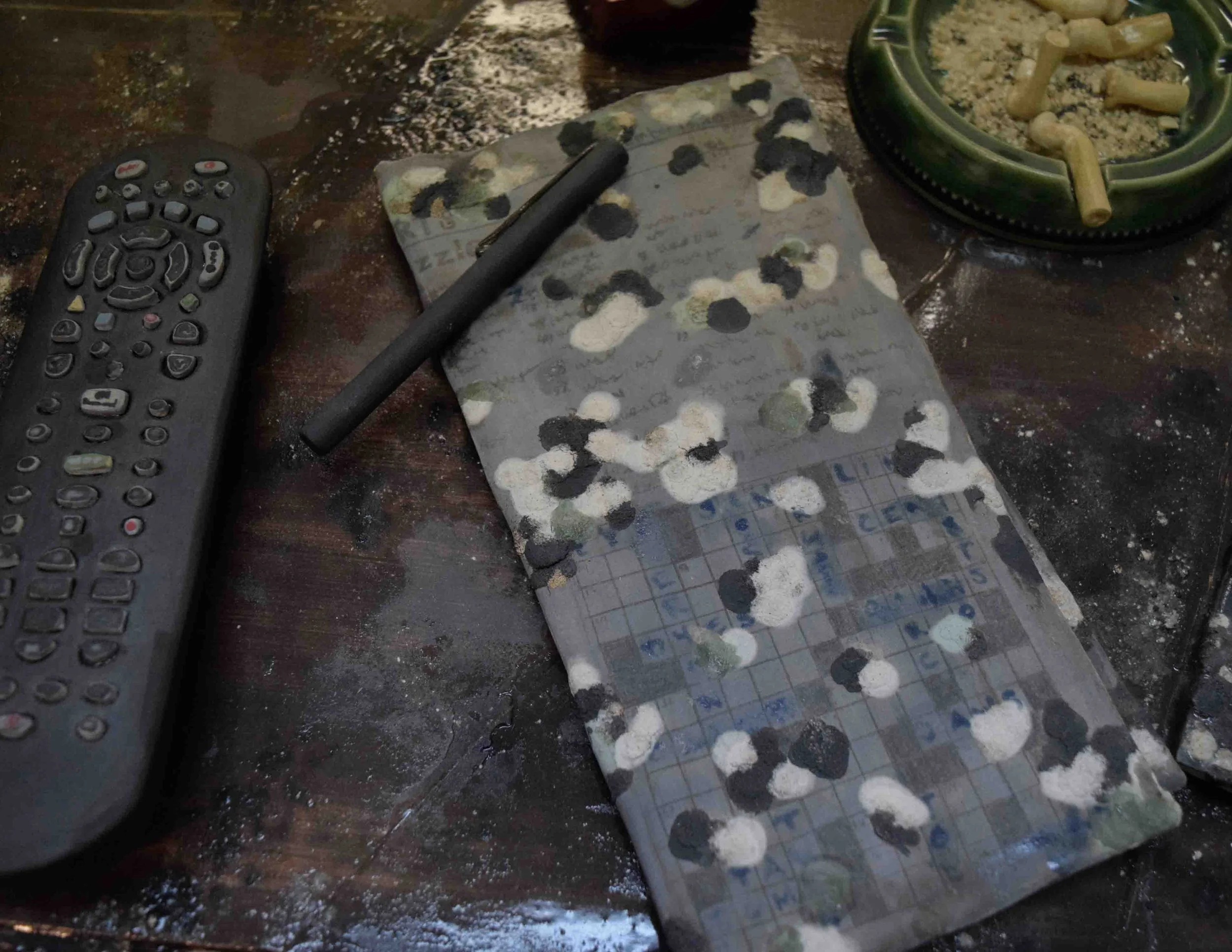 "Crossword Puzzle and Remote Control" Ceramic, 2025.