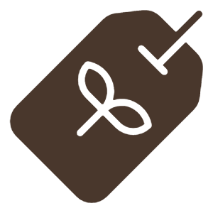A black sewing needle with green thread, and a brown luggage tag with a black string.