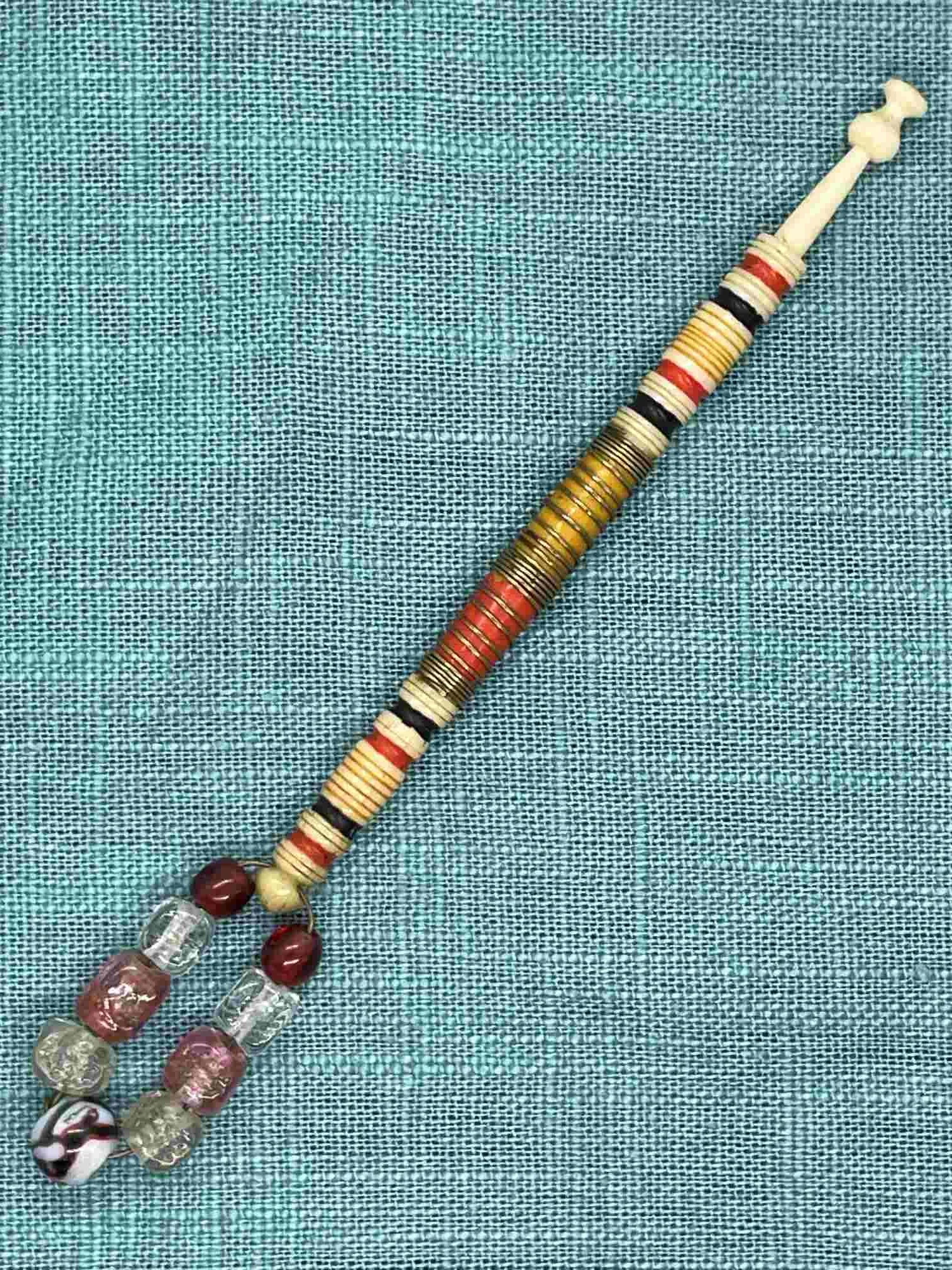 W8 Antique bone bobbin 23-7-26 back.JPG