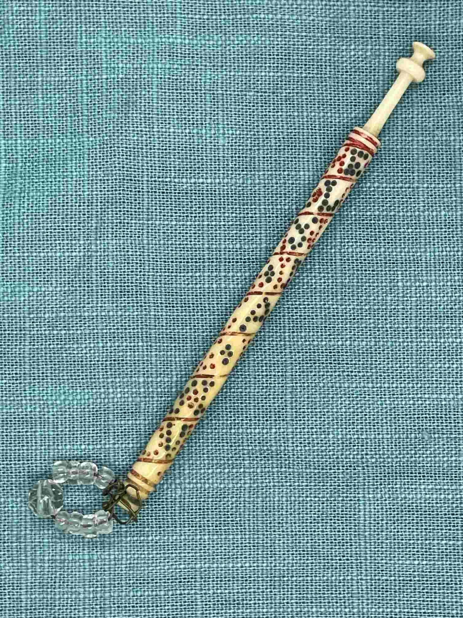 19th-century Antique Bone Bobbin with spiral inscription and spangle (our ref W10)