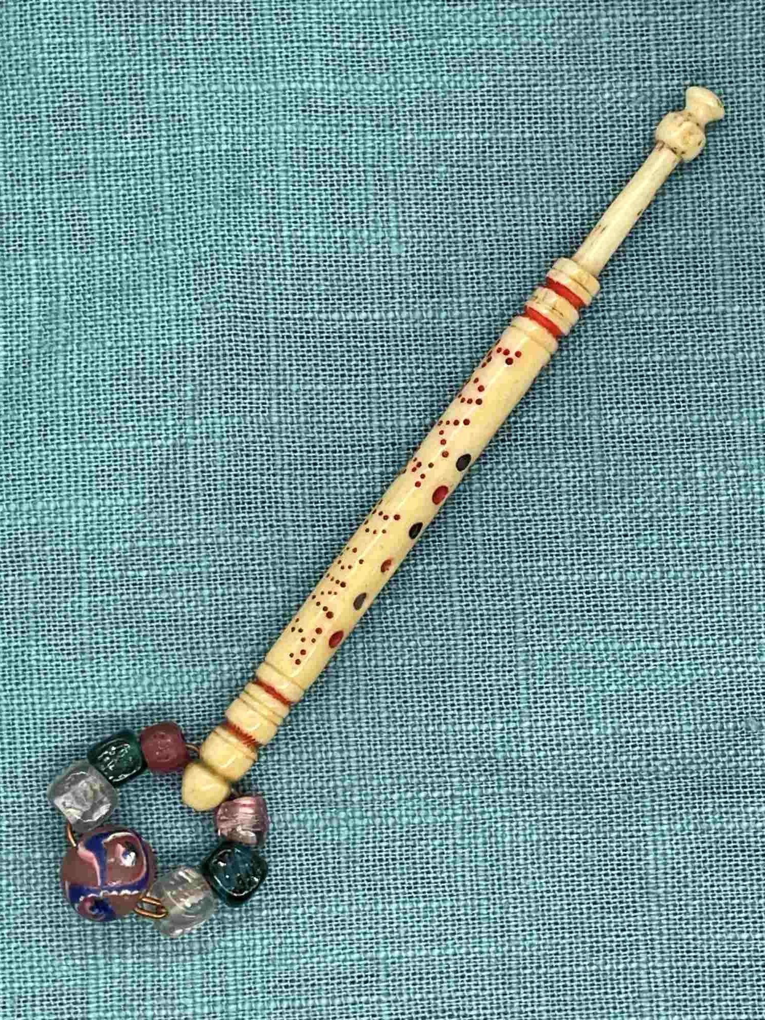 19th-century Antique Bone Bobbin inscribed 'LOVE DONT BE CRUEL' with spangle (our ref W1)