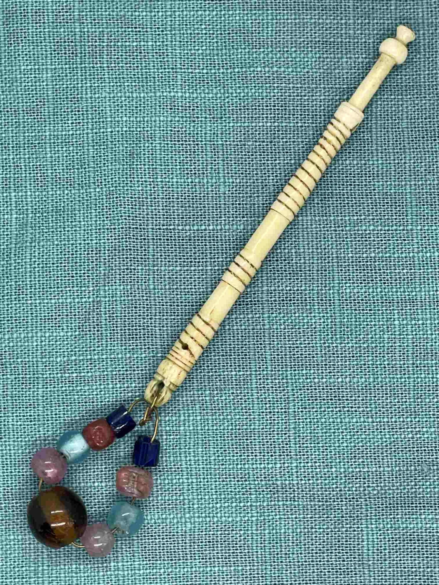 19th-century Antique Bone Bobbin with spangle (our ref W2)