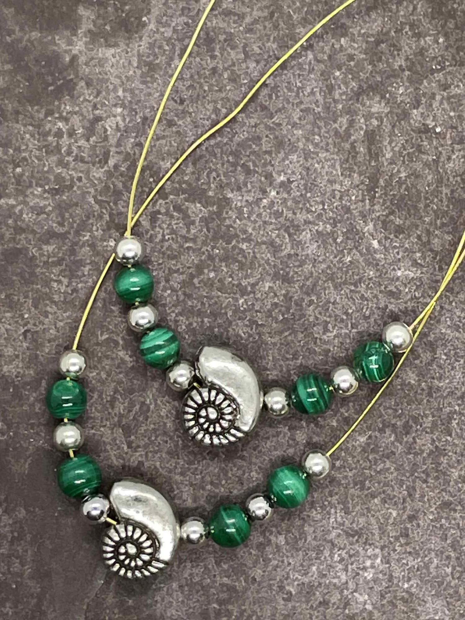 A Pair of Silver-Plated Shell Bead with Malachite spangles