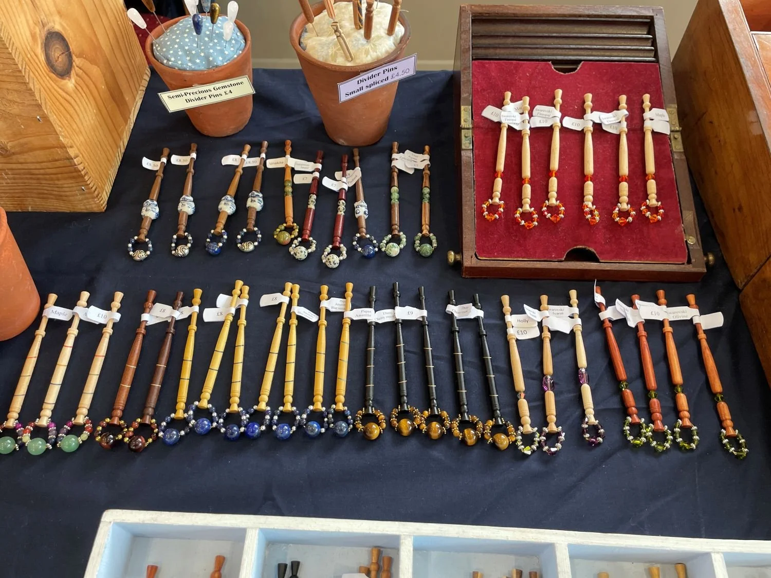 Display of Eddy's wooden lace bobbins