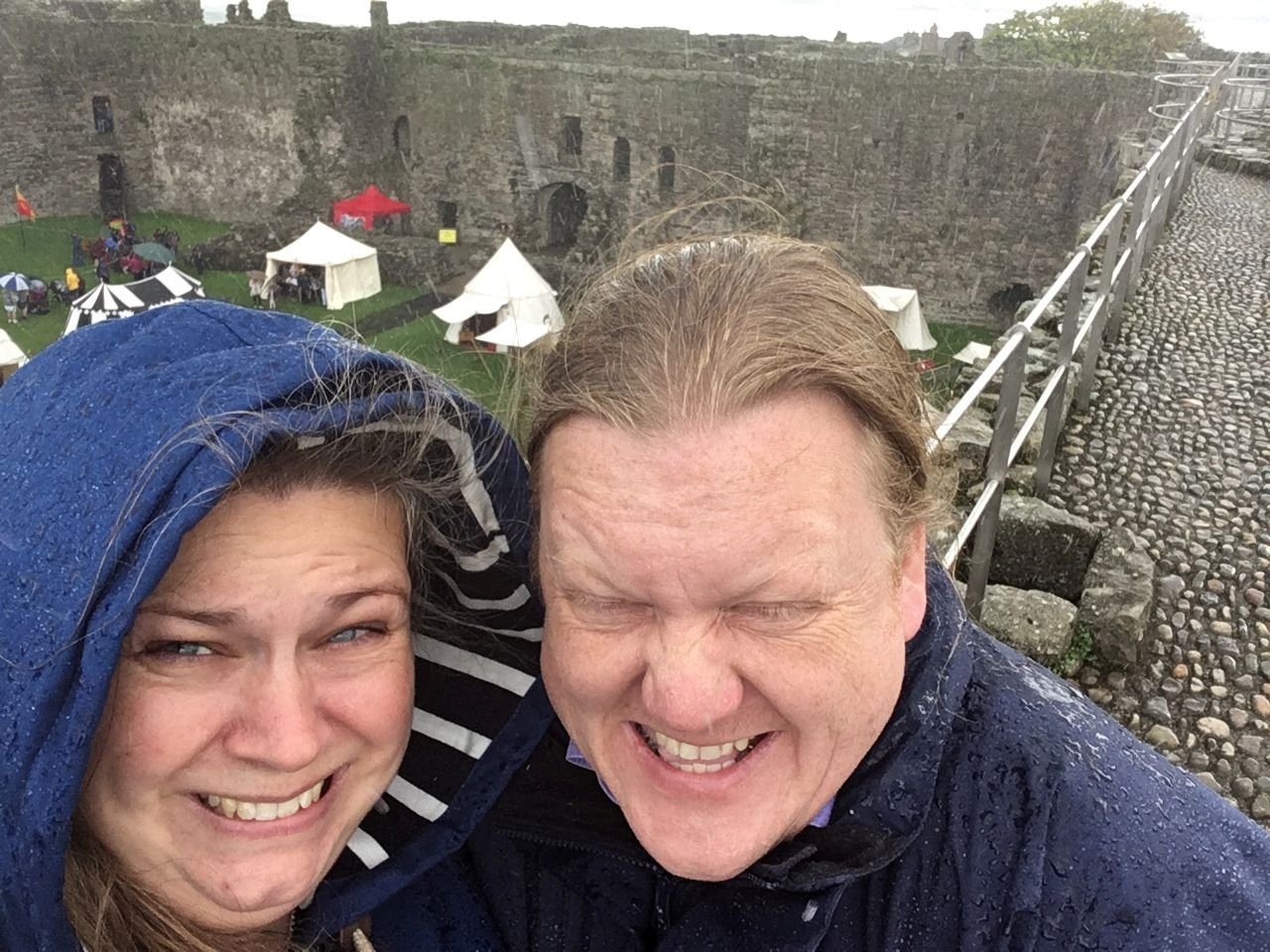 Eddy and Jo selfie in the rain at a Beaumaris Castle
