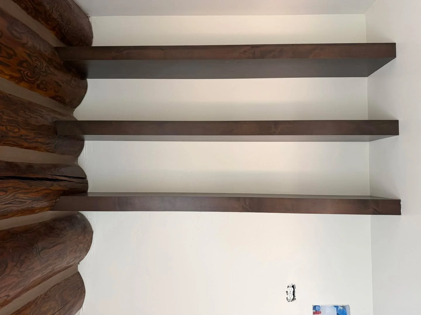 From raw timber to a finished statement piece. 🔨 These custom shelves bring warmth, character, and functionality together while complementing the beauty of this log home.

Built with intention. Finished with craftsmanship.

#customcabinetry #customw
