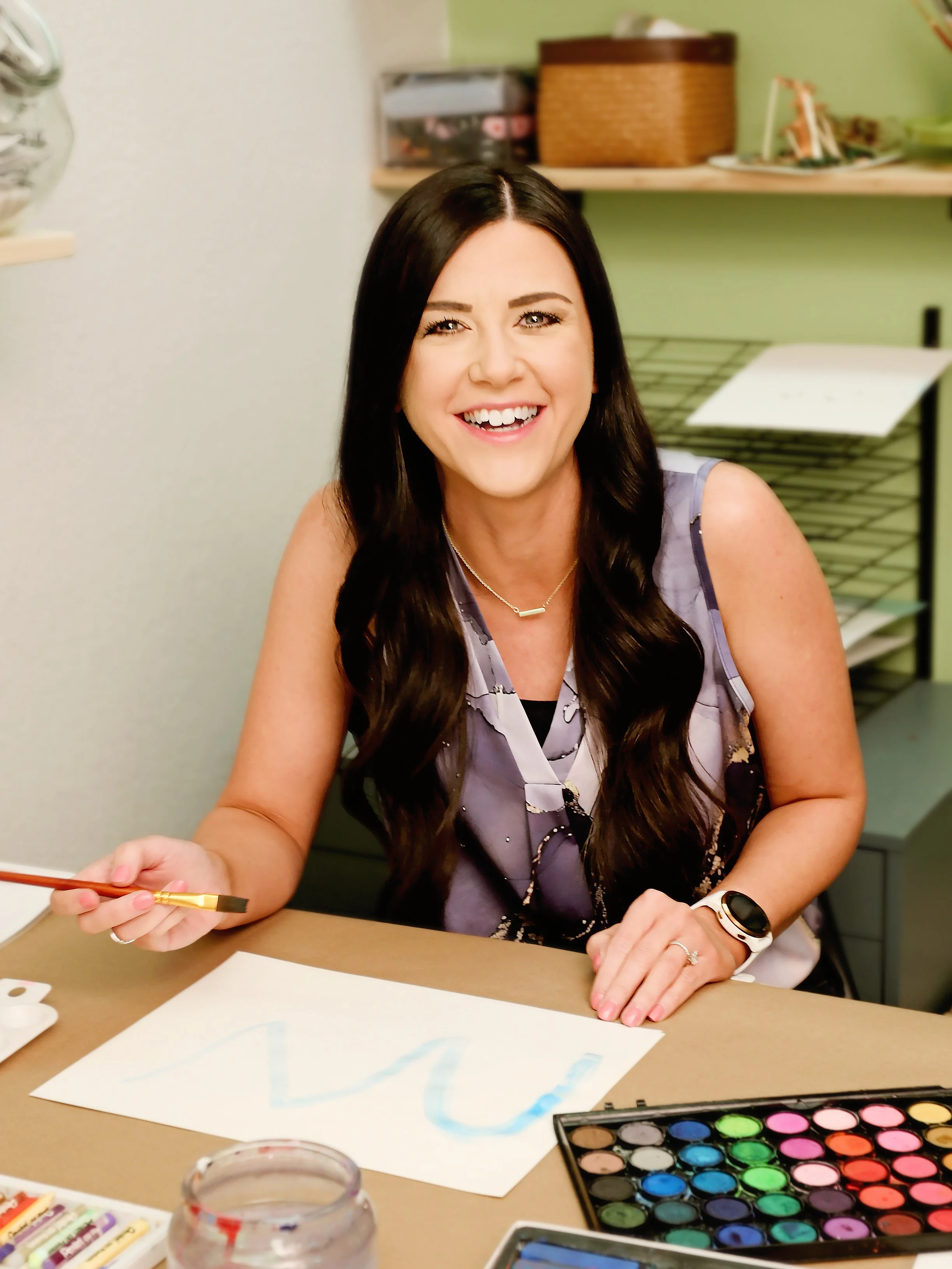 Ali in the art studio painting
