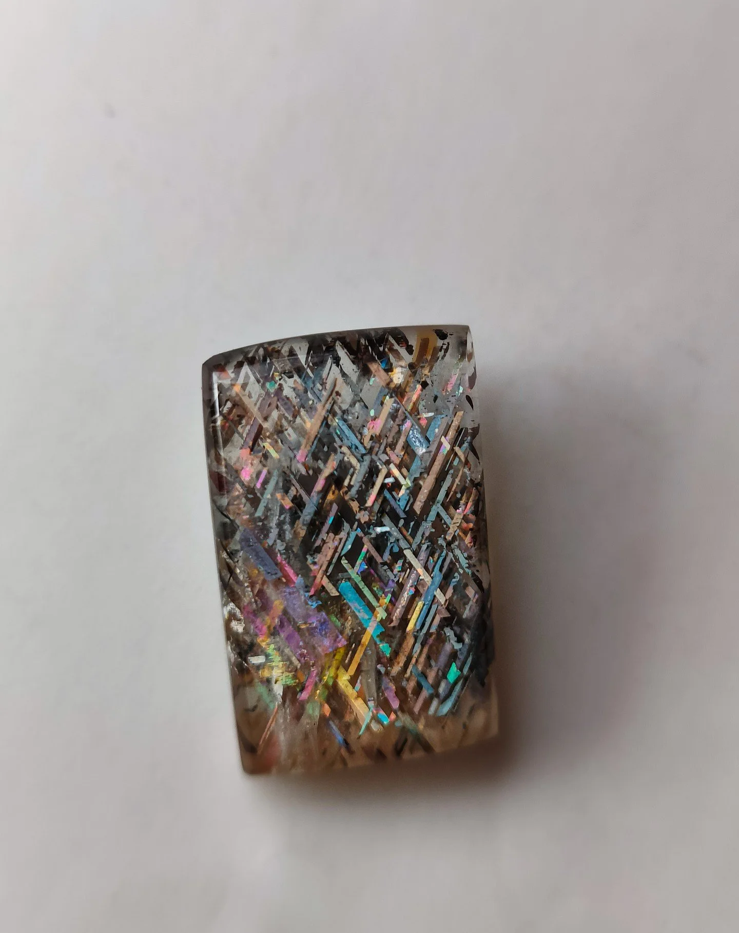 Rainbow lattice Sunstone 

Locality - Harts Range, NT, AUST
Type - Cabochon 
Size -13mm x 9mm
Weight - 3.190 crt

All stone posted are available on toppagems.com. 
Available unless Marked as &quot;Sold&quot; in the description.
#gemstone #crystals #m