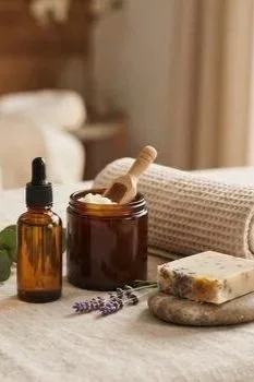 essential-oils-and-natural-spa-products-on-a-massage-table-photo.jpg
