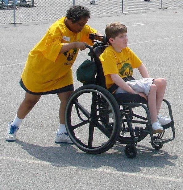 lod-boy-in-wheelchair-being-pushed.jpg