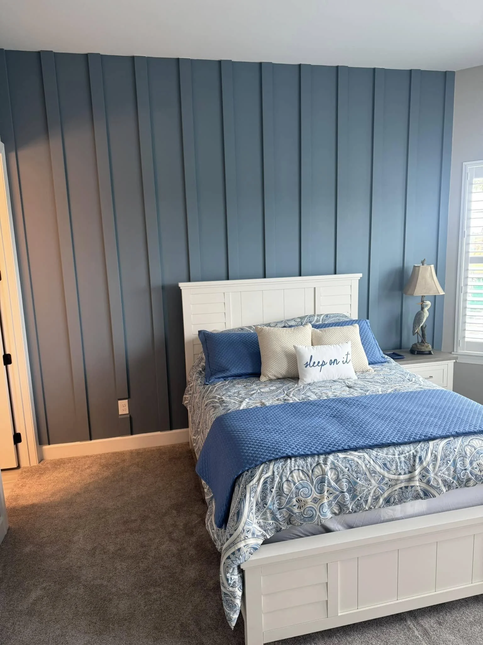 accent wall with vertical slats in blue
