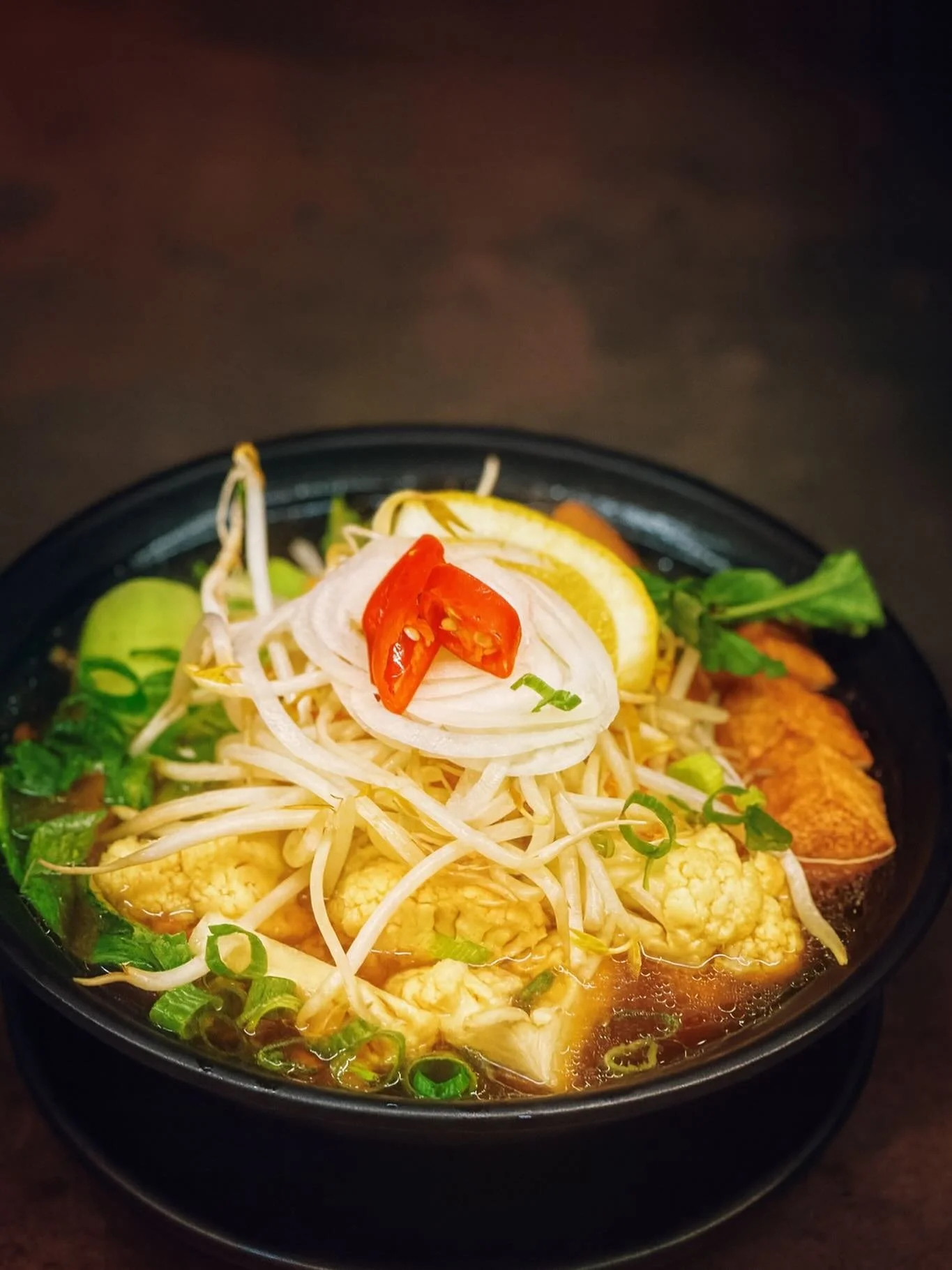 🌱✨ Warm, fresh, and full of flavour!
Dive into our Vegetable Pho &mdash; a comforting bowl loaded with crisp veggies, aromatic herbs, and rich, soul-warming broth. Perfect for any weather, any mood. 💛🍜
Fresh. Healthy. Delicious.
Come taste the goo