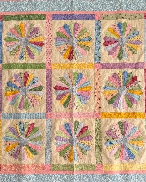 We are very fortunate to have been donated two beautiful quilts that you have the chance to win!
During October we are selling raffle tickets with two first prizes up for grabs.

Quilt 1. "Pink Pastels" kindly donated by H Cook &amp; Toowoo