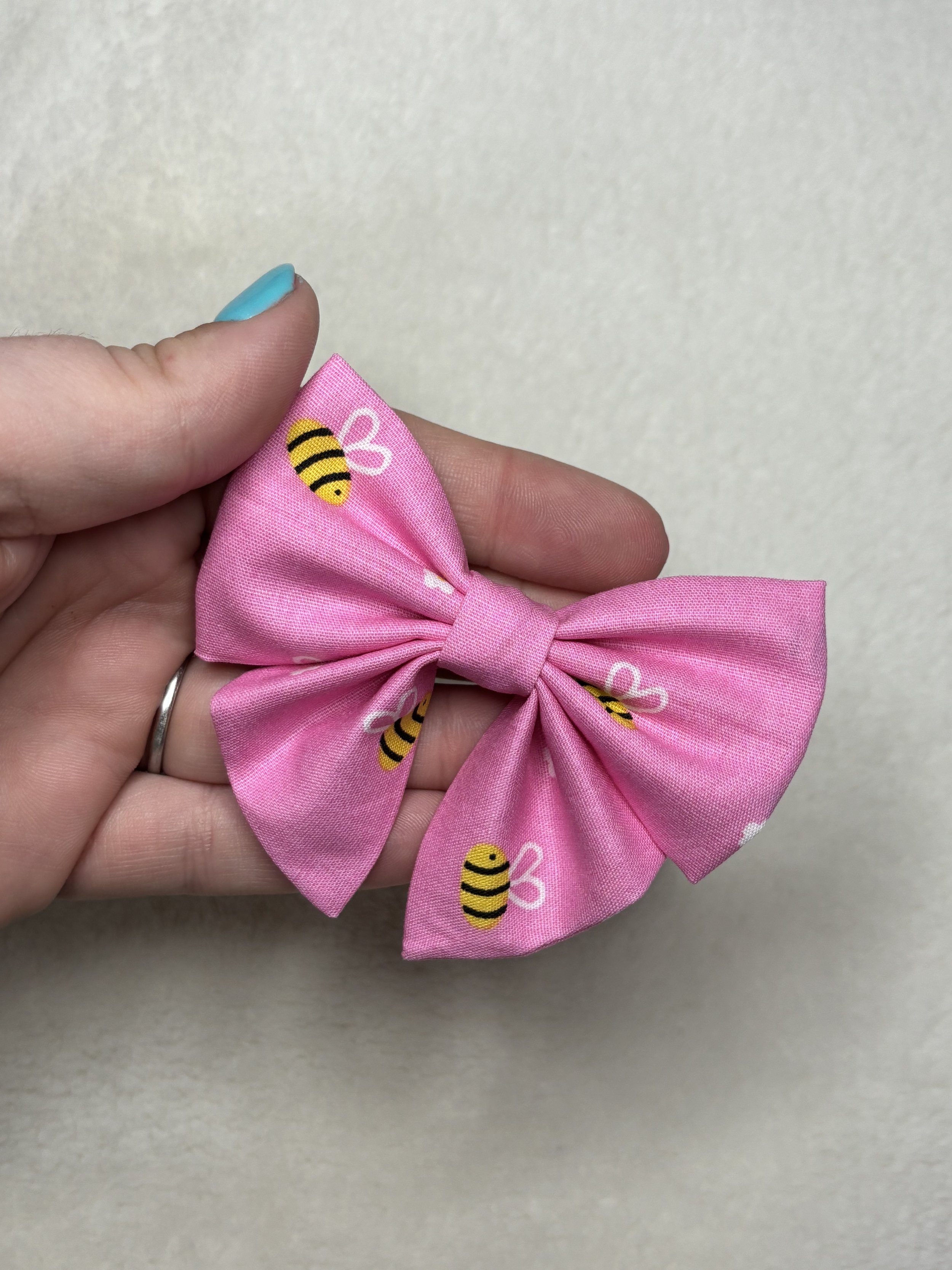 Pink bees small tailed bow