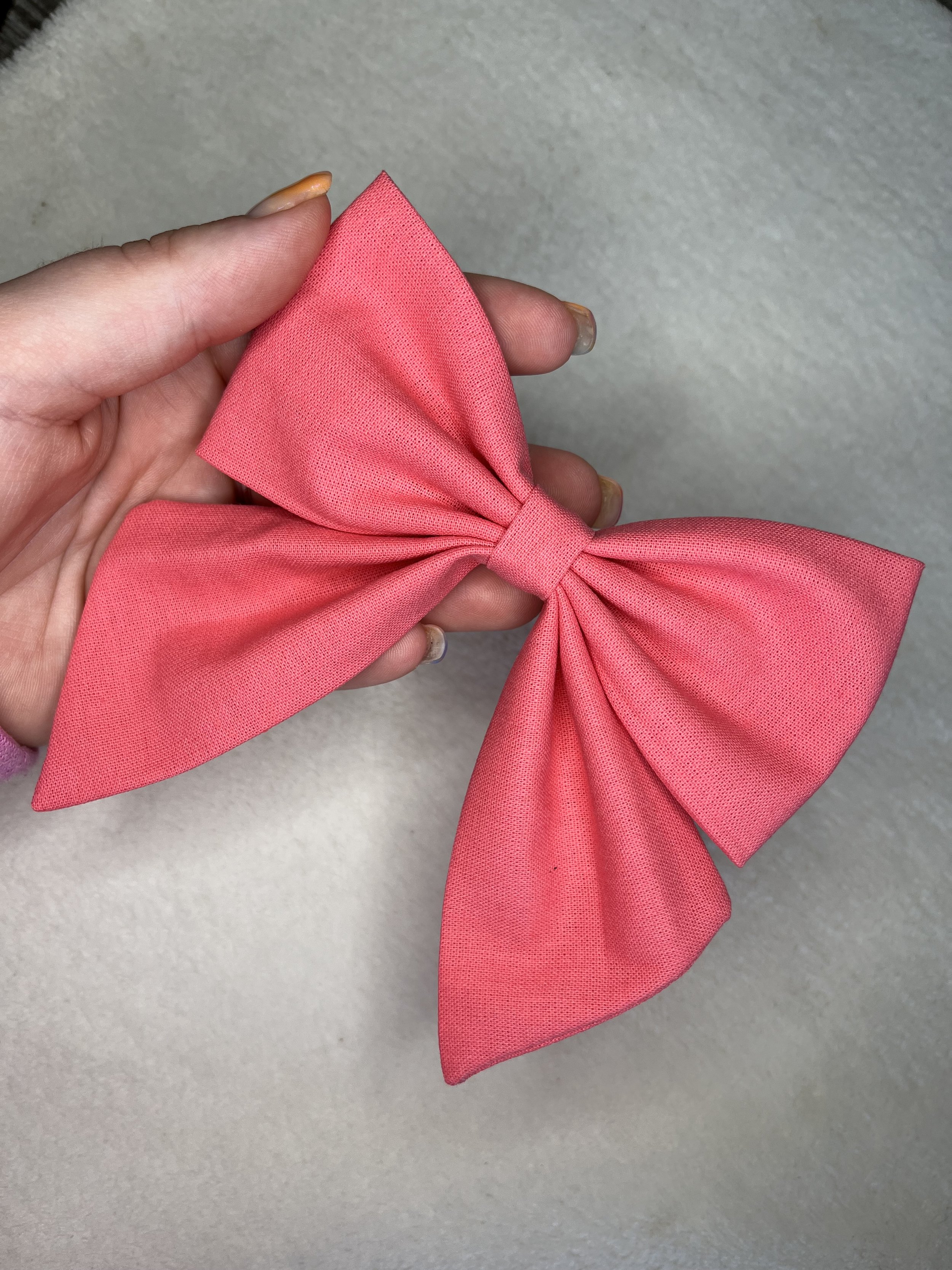 Coral occasion bow.