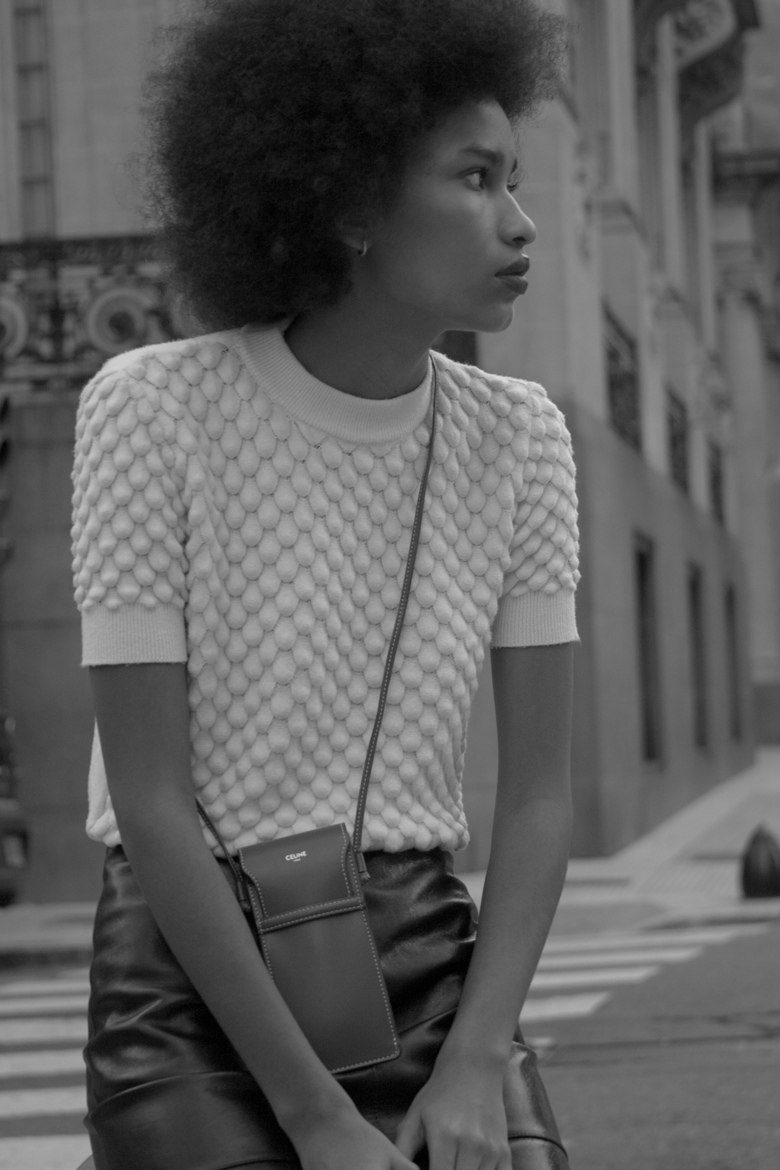 Editorial photoshoot styling action in a premium fashion studio