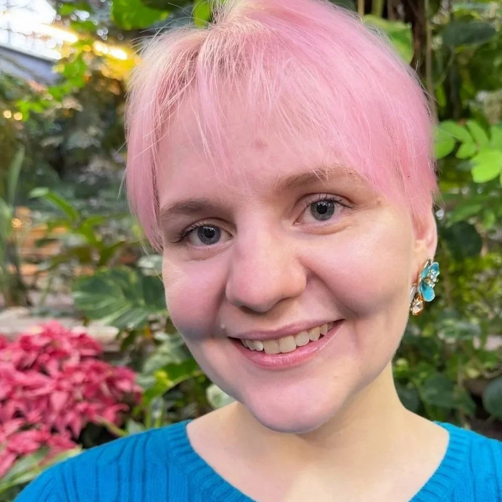 headshot of Melanie