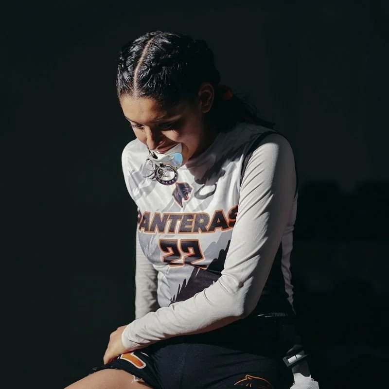 young professional athlete sitting