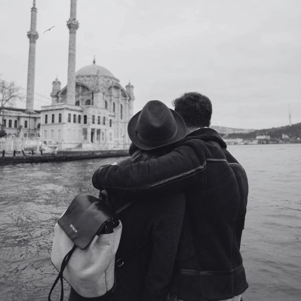 man and woman hugging
