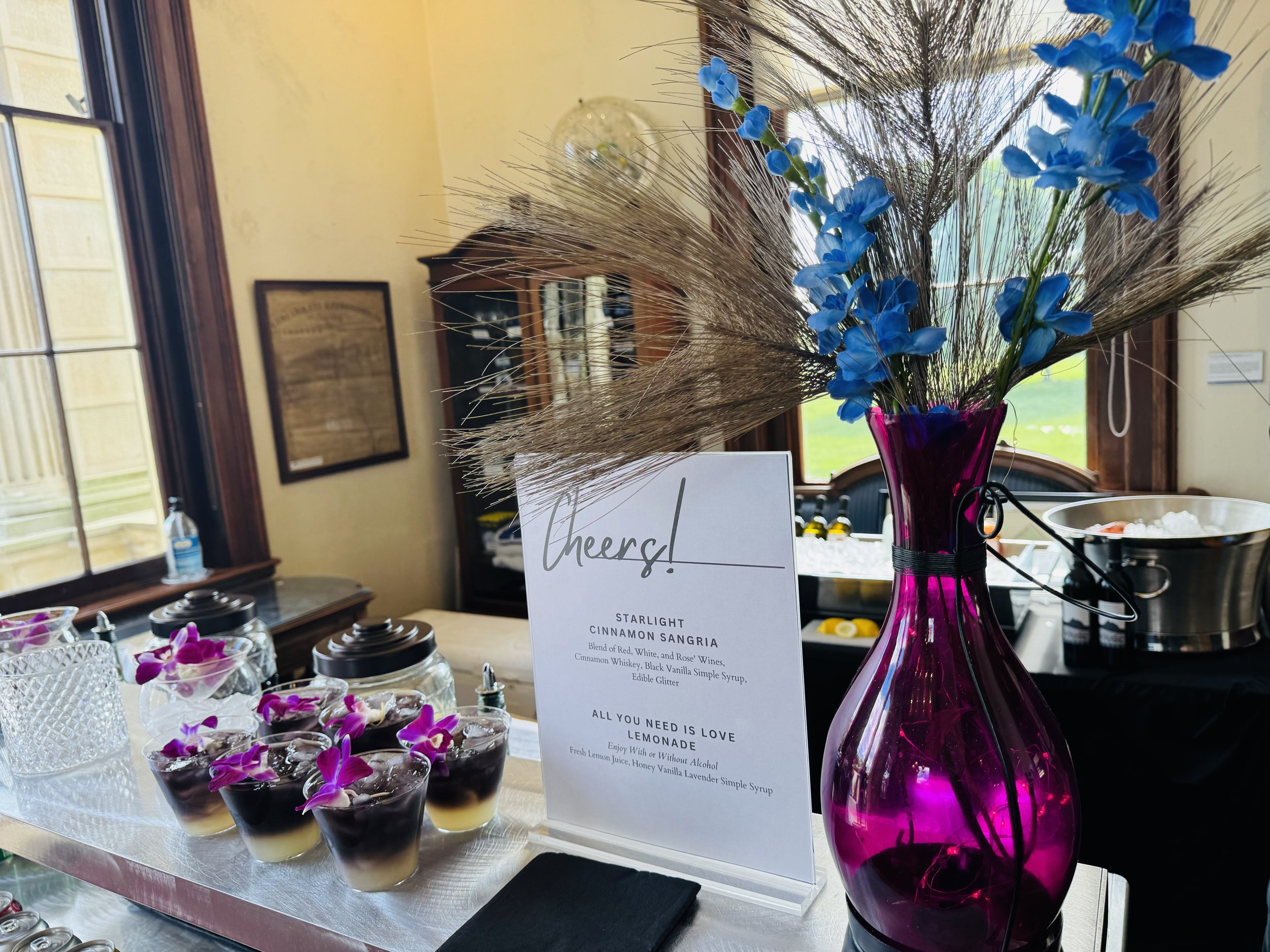 Welcome Cocktail with Edible Flower Garnish.