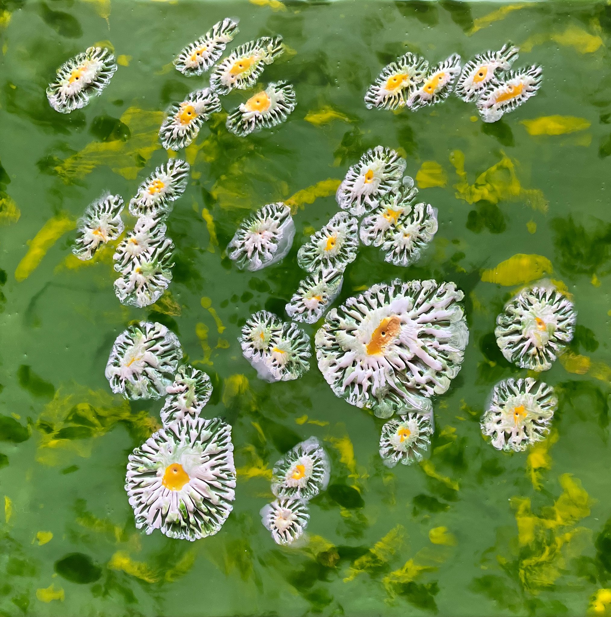 SOLD - Summer Meadow - This 12" x 12” encaustic abstract painting represents a field of daisies in a summer meadow. The artwork is created with encaustic wax on a cradled birch panel.