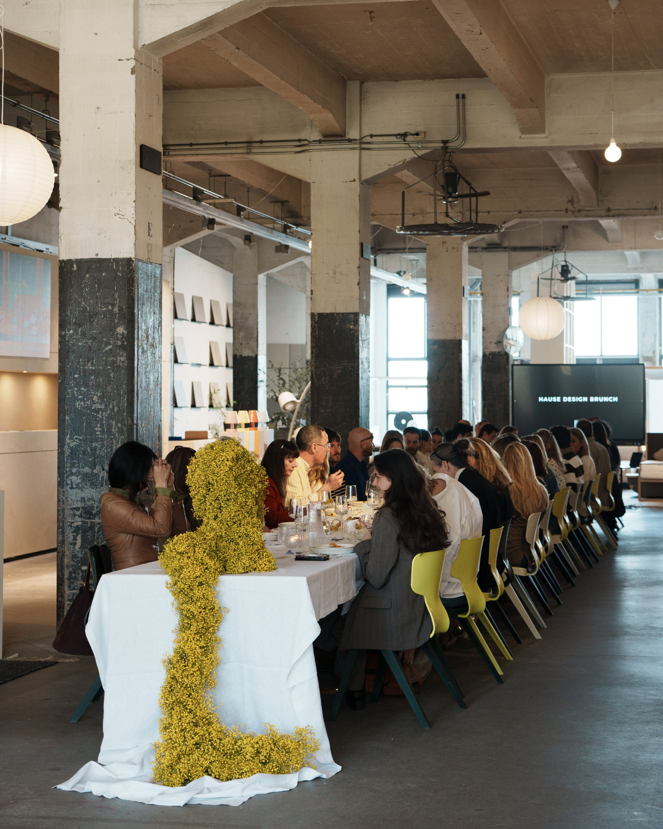 oury-home-pr-brunch-guests-long-table.png