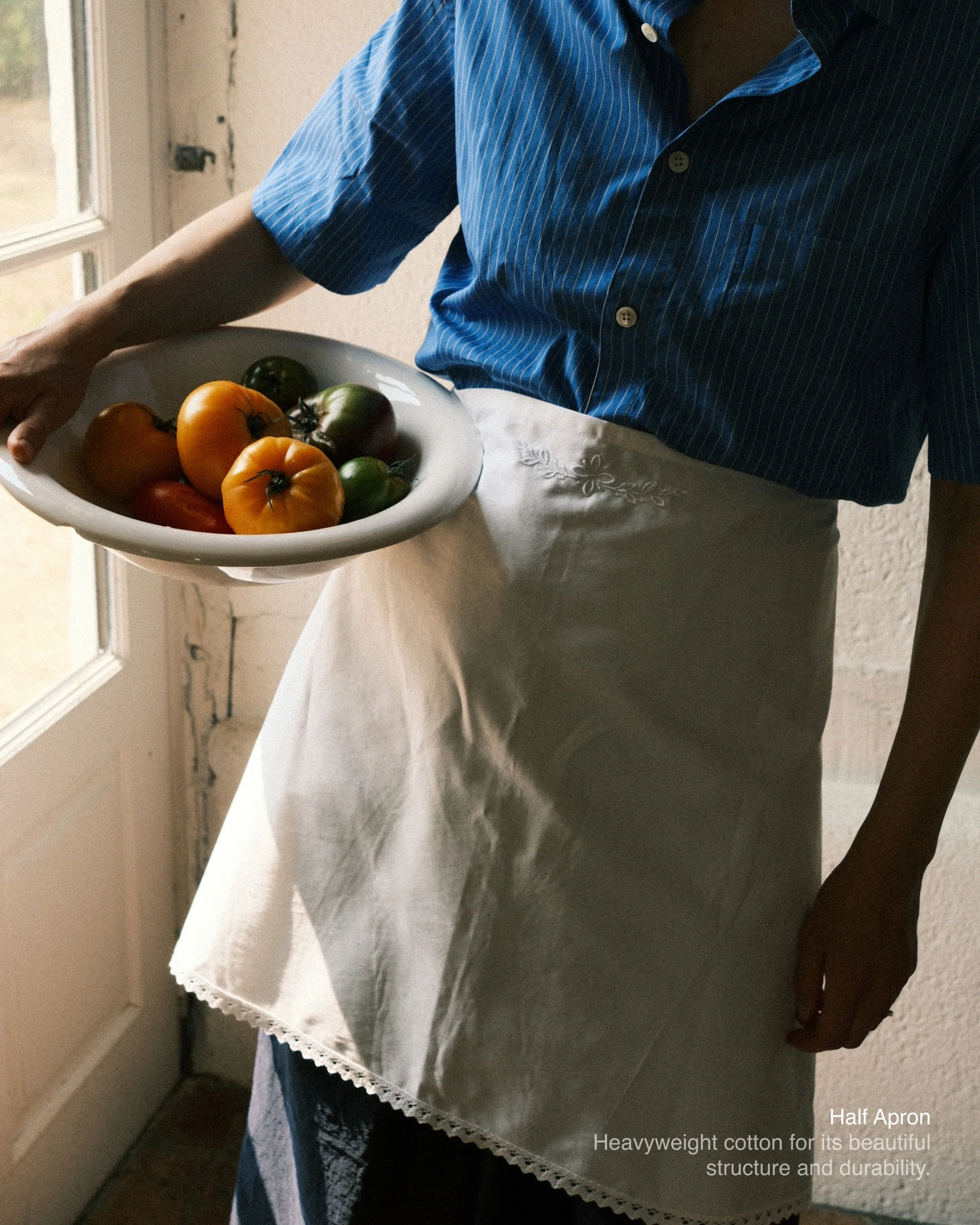 Introducing our new research study. Exploring shapes, proportions, and the little details that give everyday garments their character.

Our new apron, made from heavyweight cotton with delicate crochet lace, is handcrafted in our Amsterdam atelier an