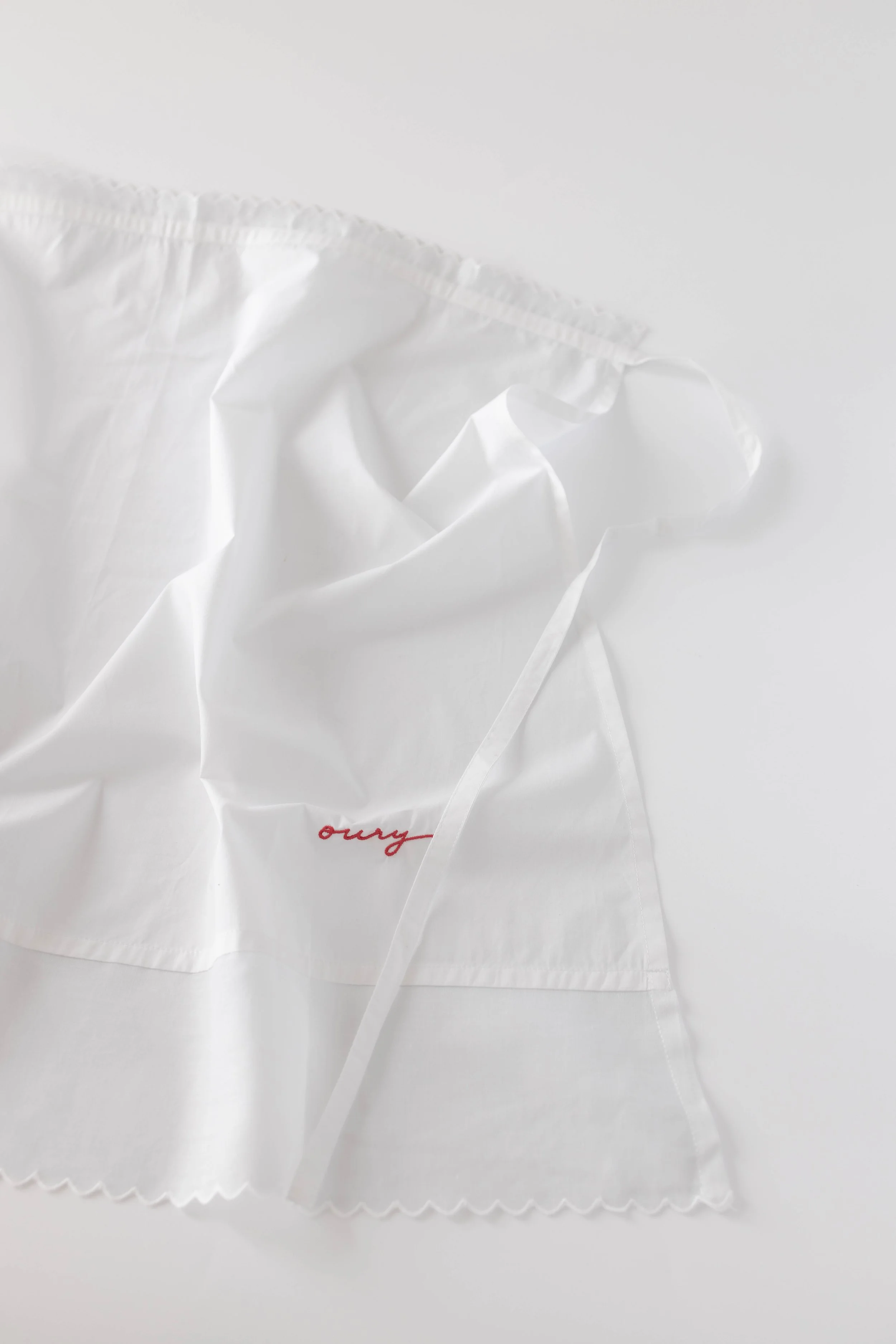 OURY HOME White Apronnwith red embroidery (1 of 1).jpg