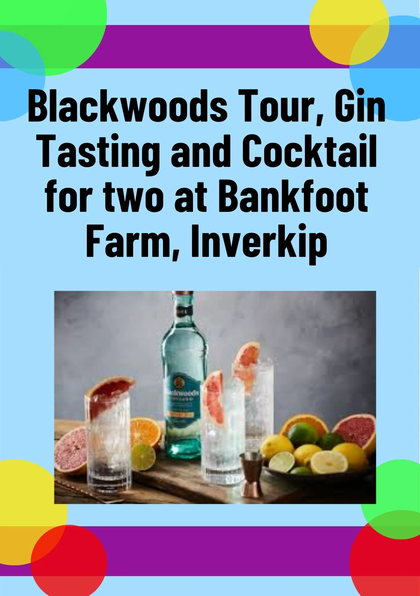 A bottle of gin surrounded by glasses, slices of grapefruit, lemon, and lime, and a bowl of assorted fruits on a wooden surface.