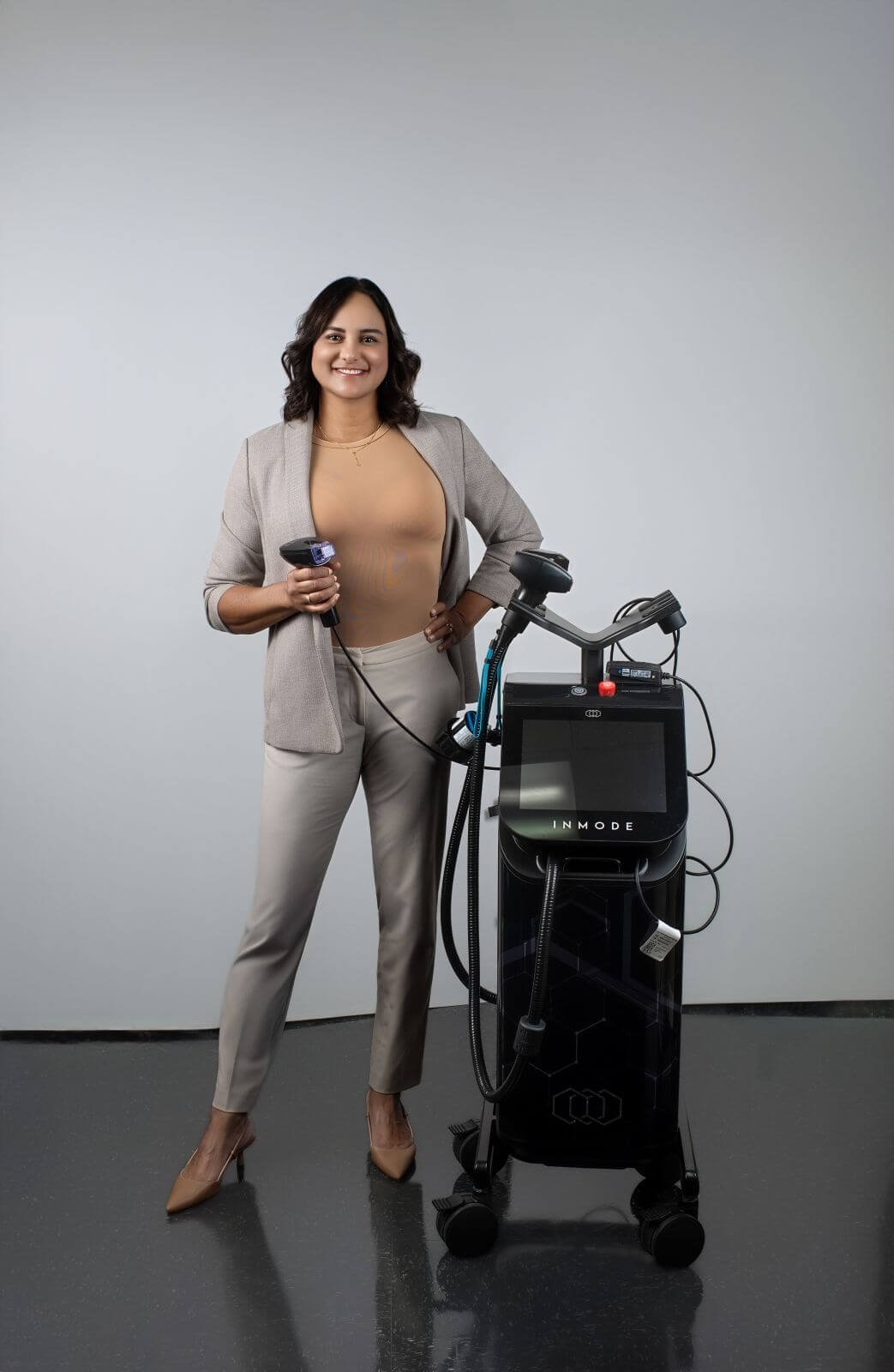 Registered nurse Elena providing aesthetic treatment at Enova MedSpa