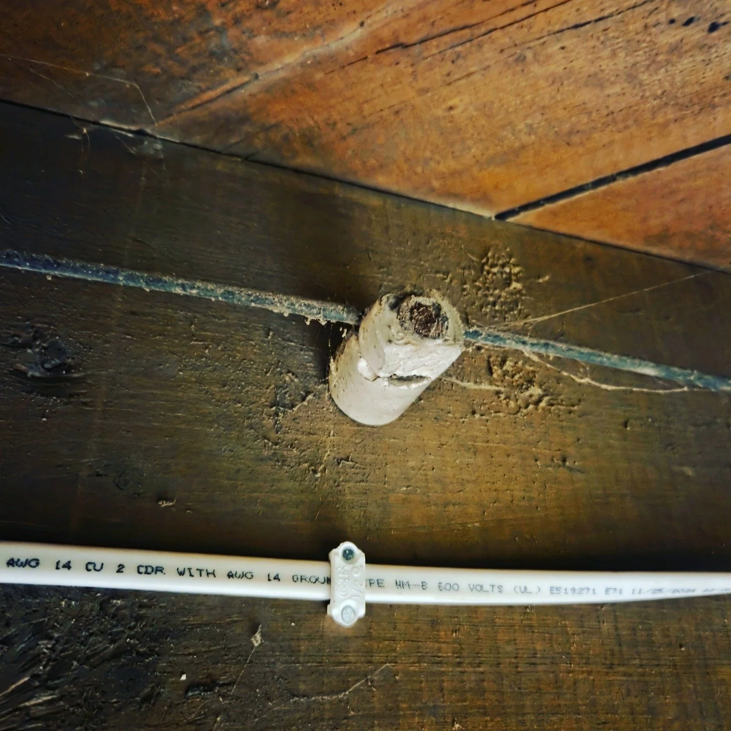 Old and new. Knob and tube wiring was the original technology for the first electrified homes. Today, we have NM cable, commonly called by the brand name Romex.